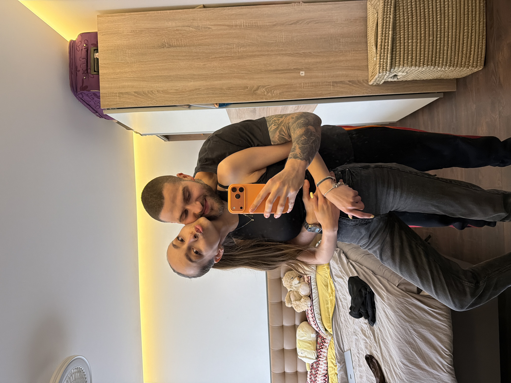 Couple Takes Multiple Selfies in Sofia Apartment