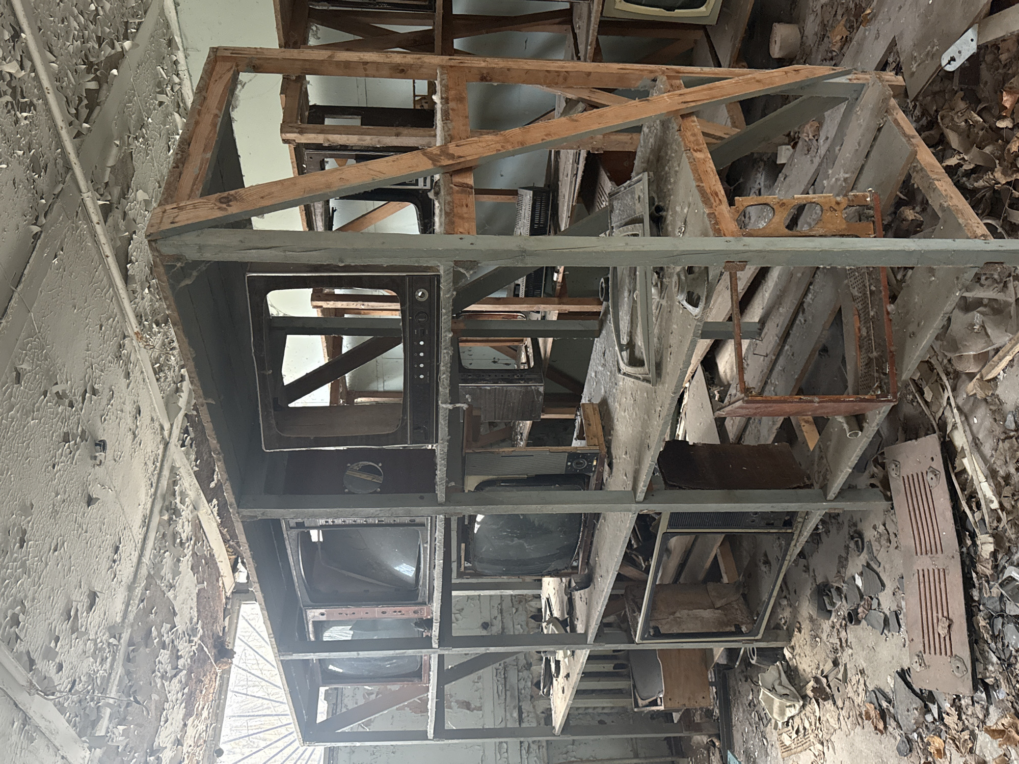 Abandoned televisions documented in decaying Pryp'yat' building