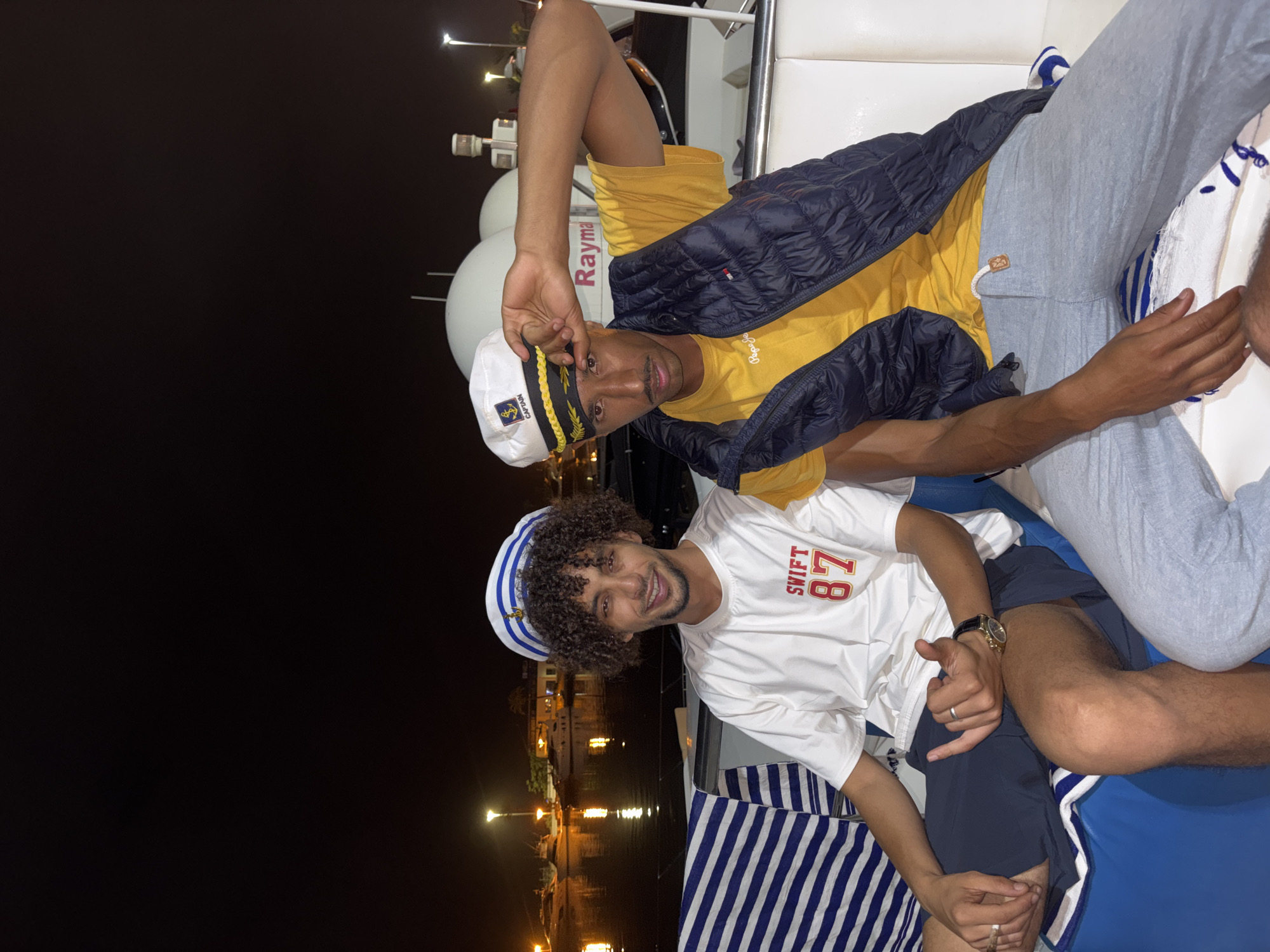 Night gathering on a boat deck in M'Diq, Morocco