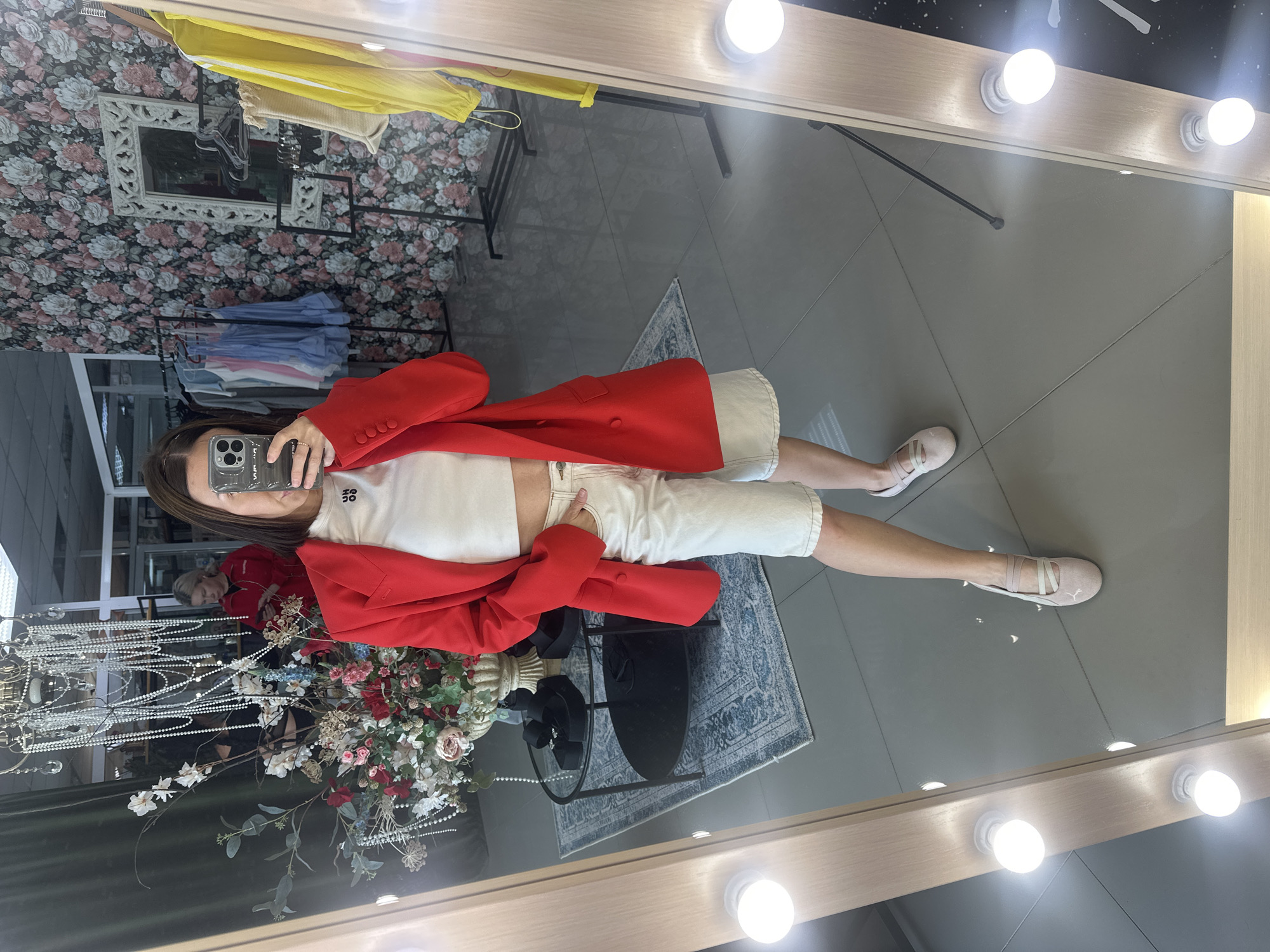 Woman takes mirror selfies in Votkinsk boutique