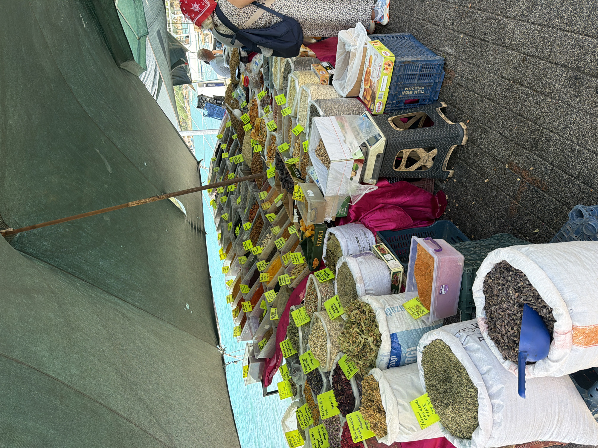 Bodrum waterfront market: spices, textiles, and harbor views