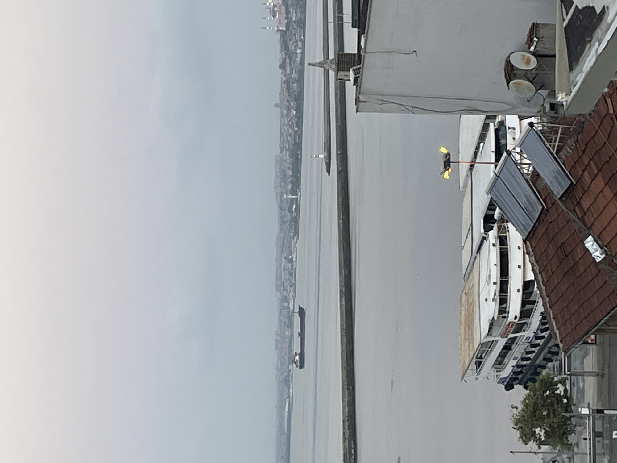 Kadıköy at night: rooftops, ferries, and quiet streets