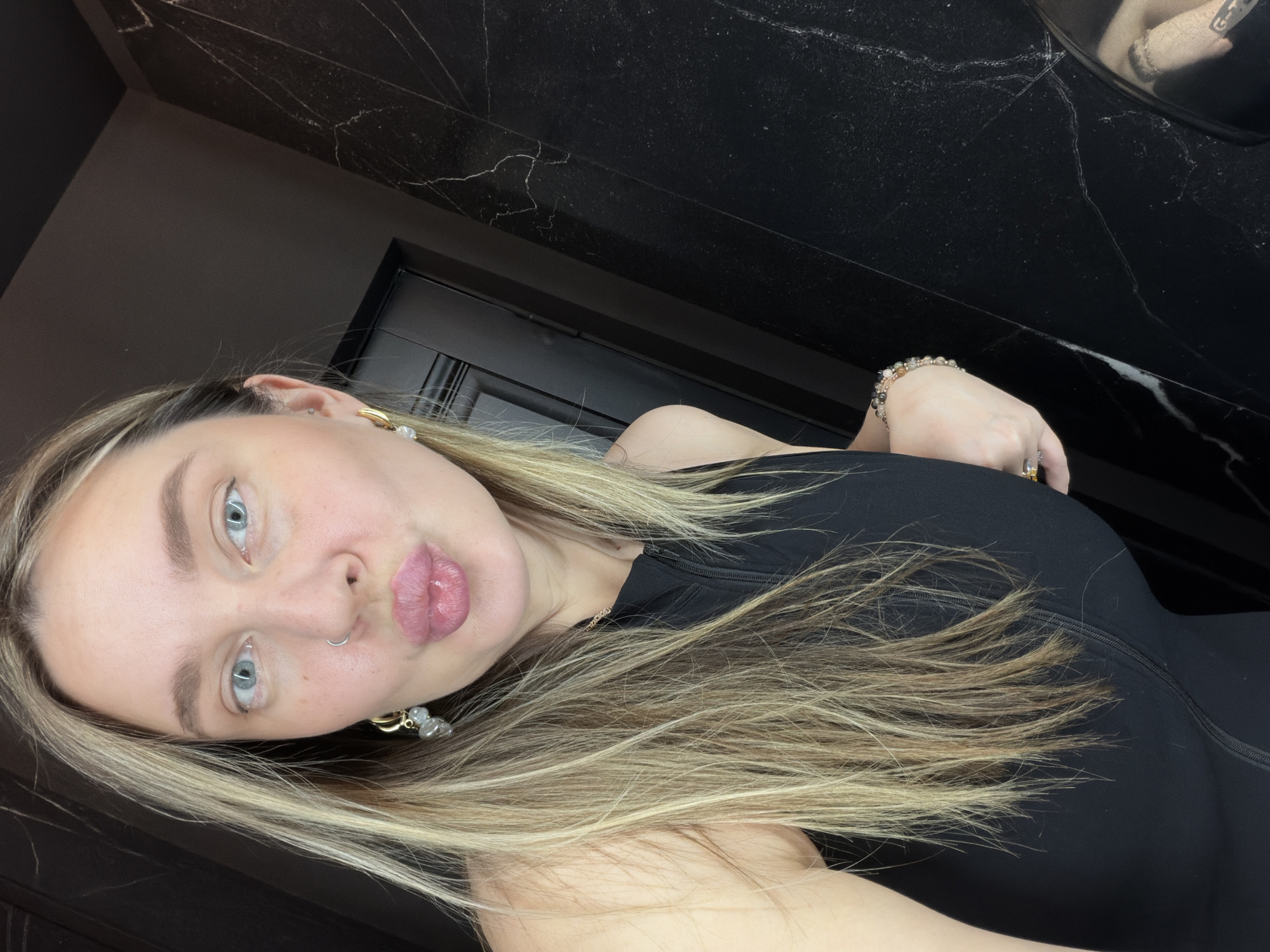 Woman takes selfies in Moscow bathroom Sunday morning