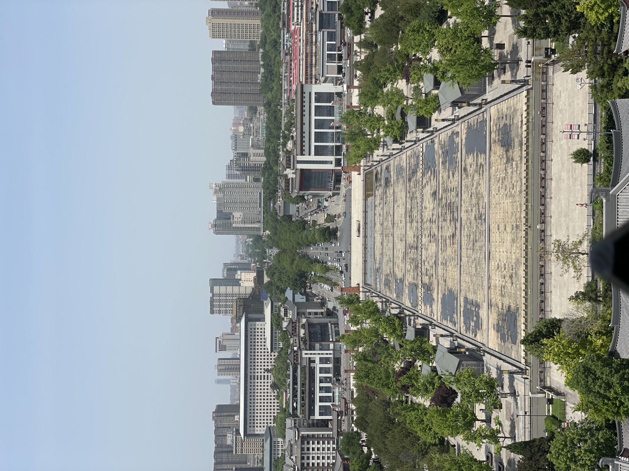 Tourist documents historic and modern Yanta District landmarks