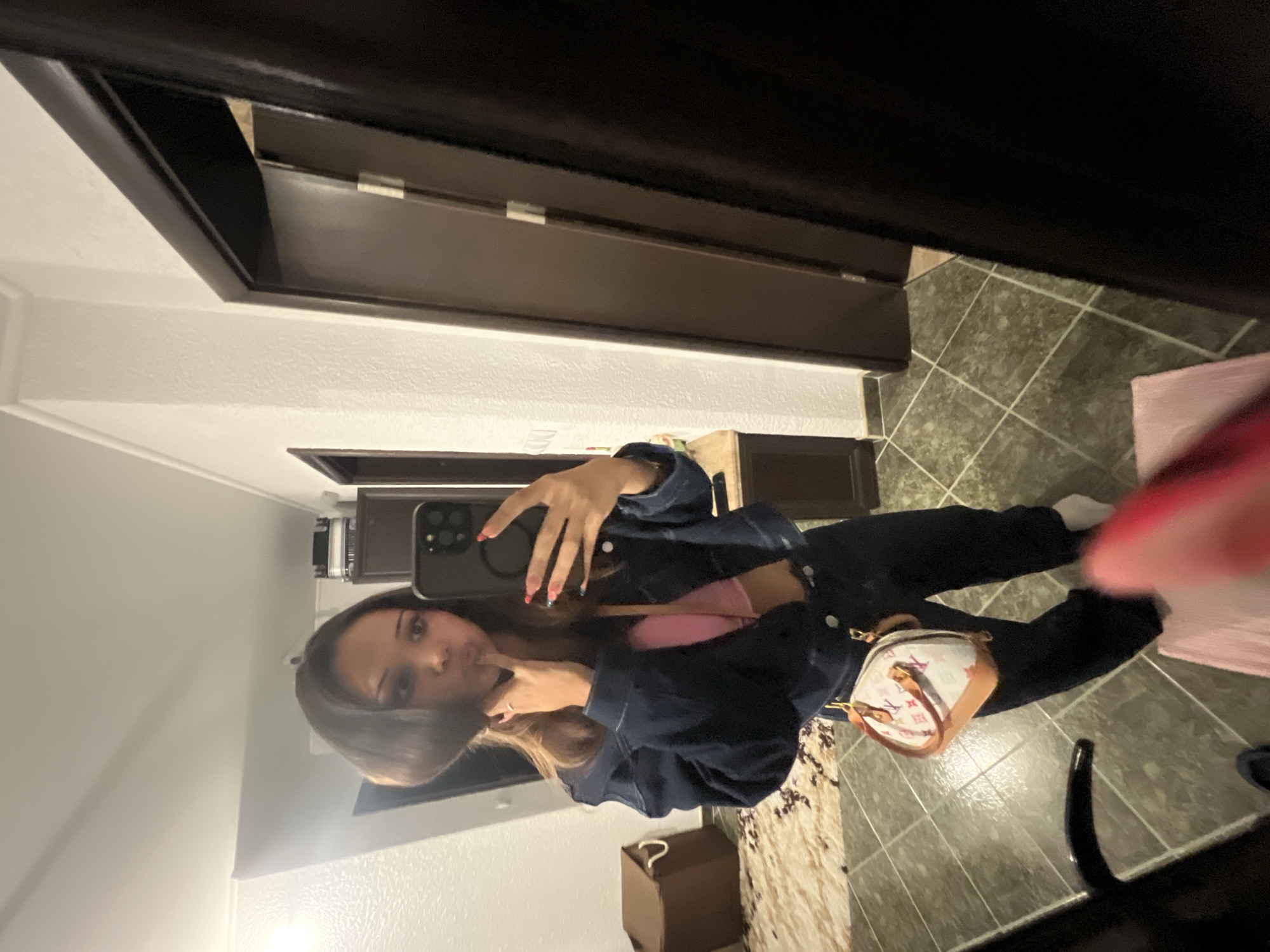 Mirror selfies in a Zlatograd hallway before heading out