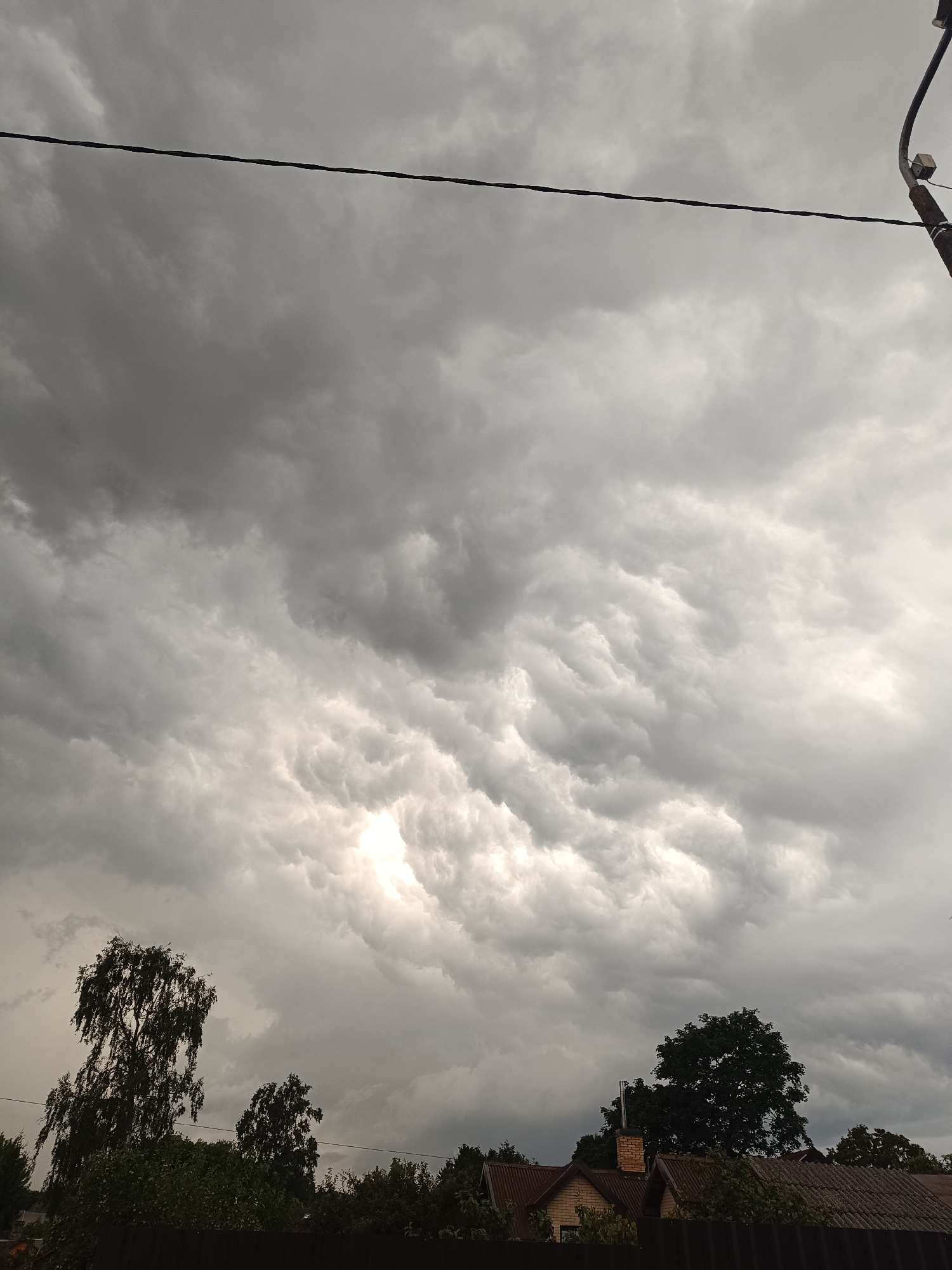 Storm clouds gather over Riga on a summer evening