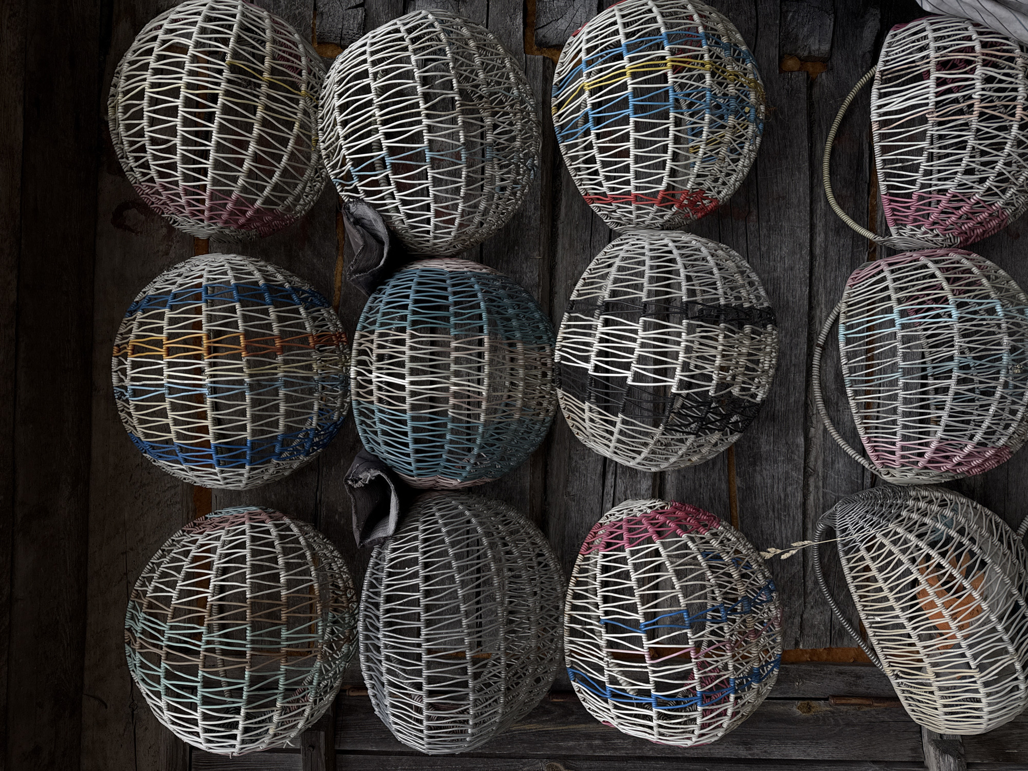Traditional wicker baskets displayed in rural Belarus marketplace
