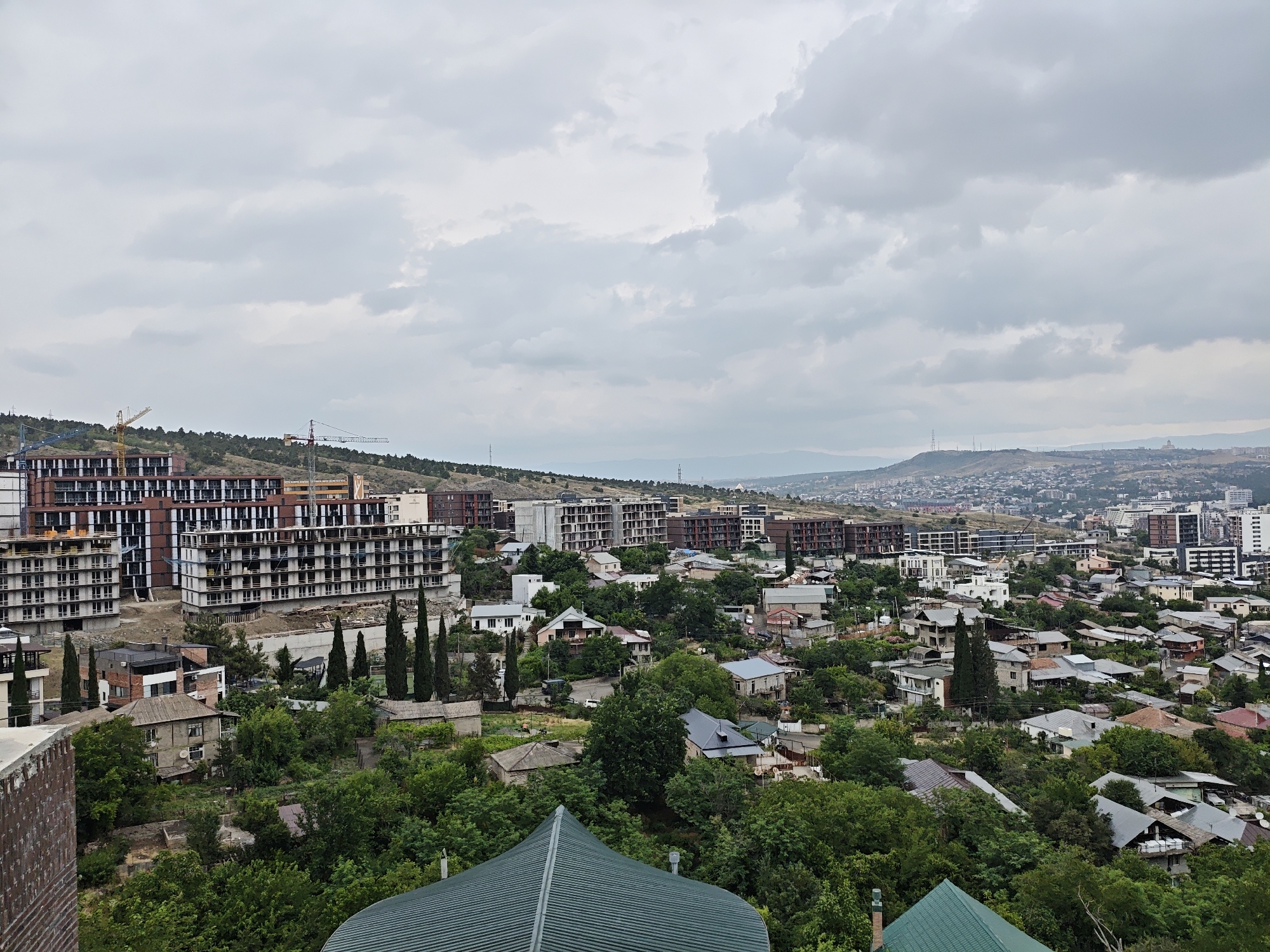 Tbilisi hillside views, city sprawl, and urban greenery
