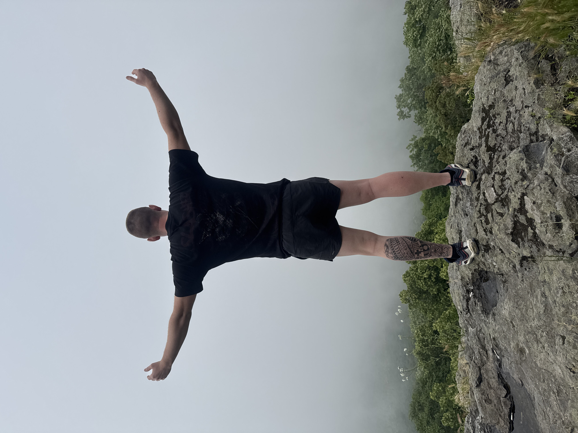 Person observed on cliff edge overlooking landscape near Sozopol