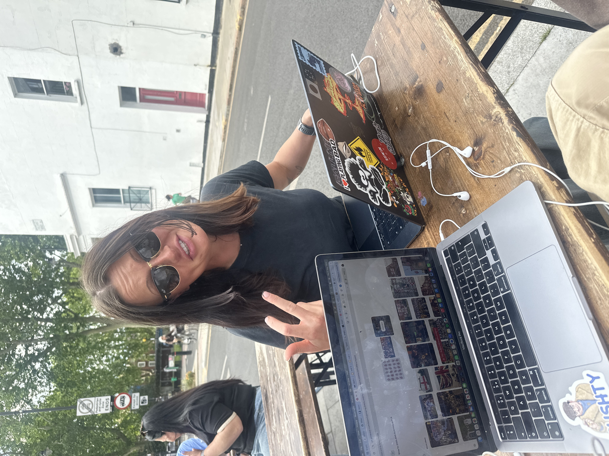 Outdoor laptop work session captured in London street