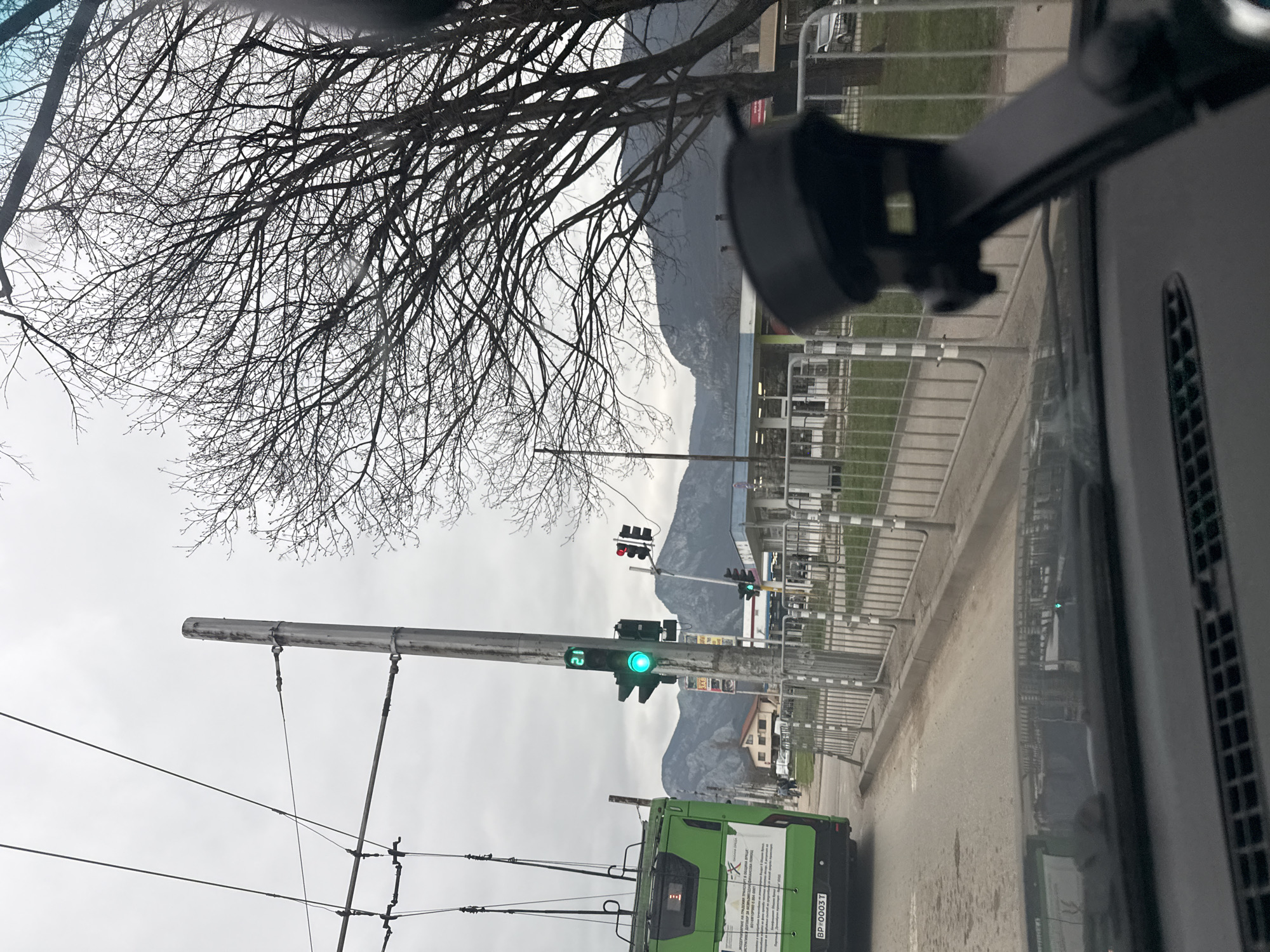 Trolleybus stops at traffic light in Vratsa, Bulgaria