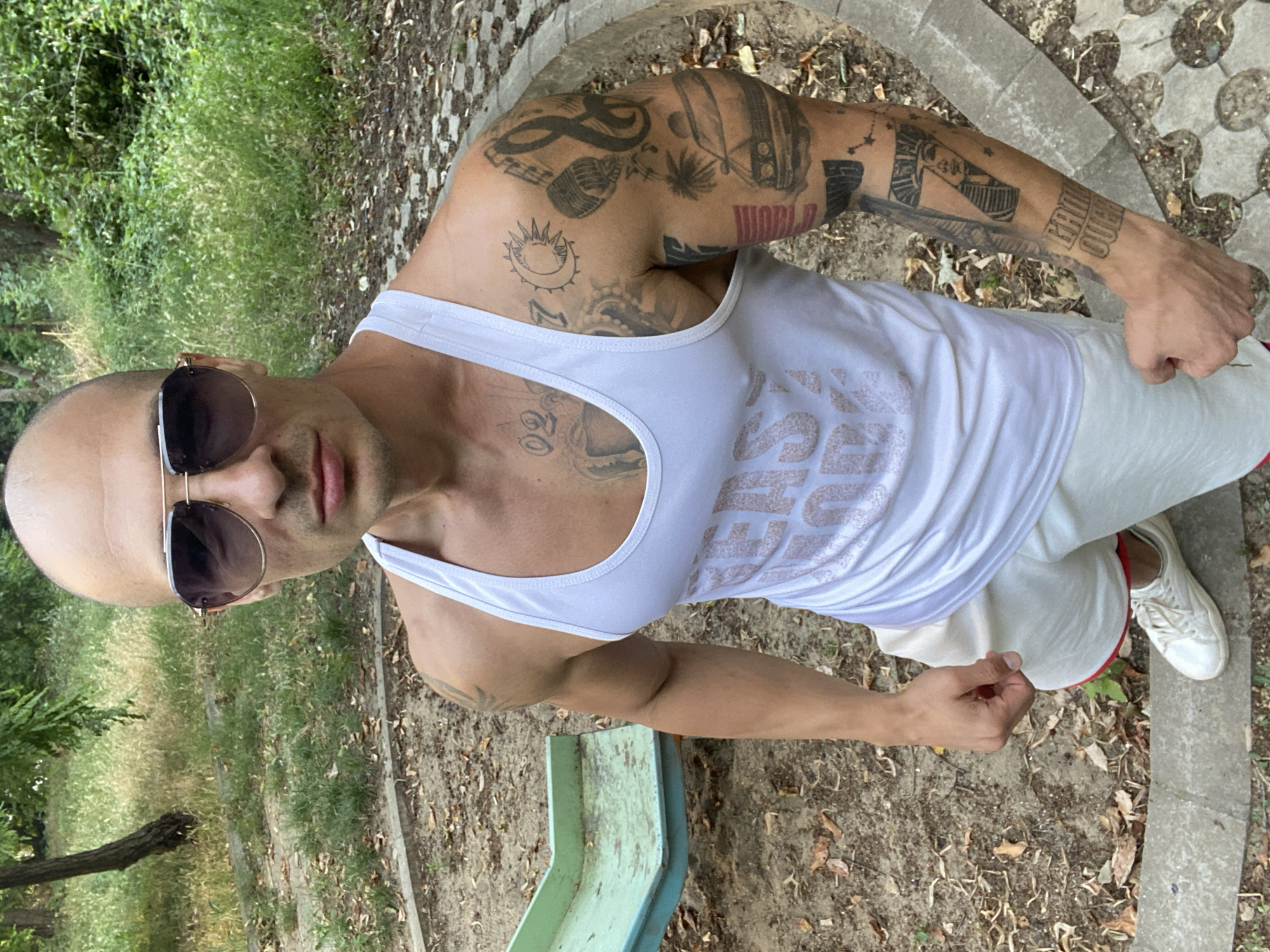 Afternoon hangout at a Pleven playground, tattoos and a dog