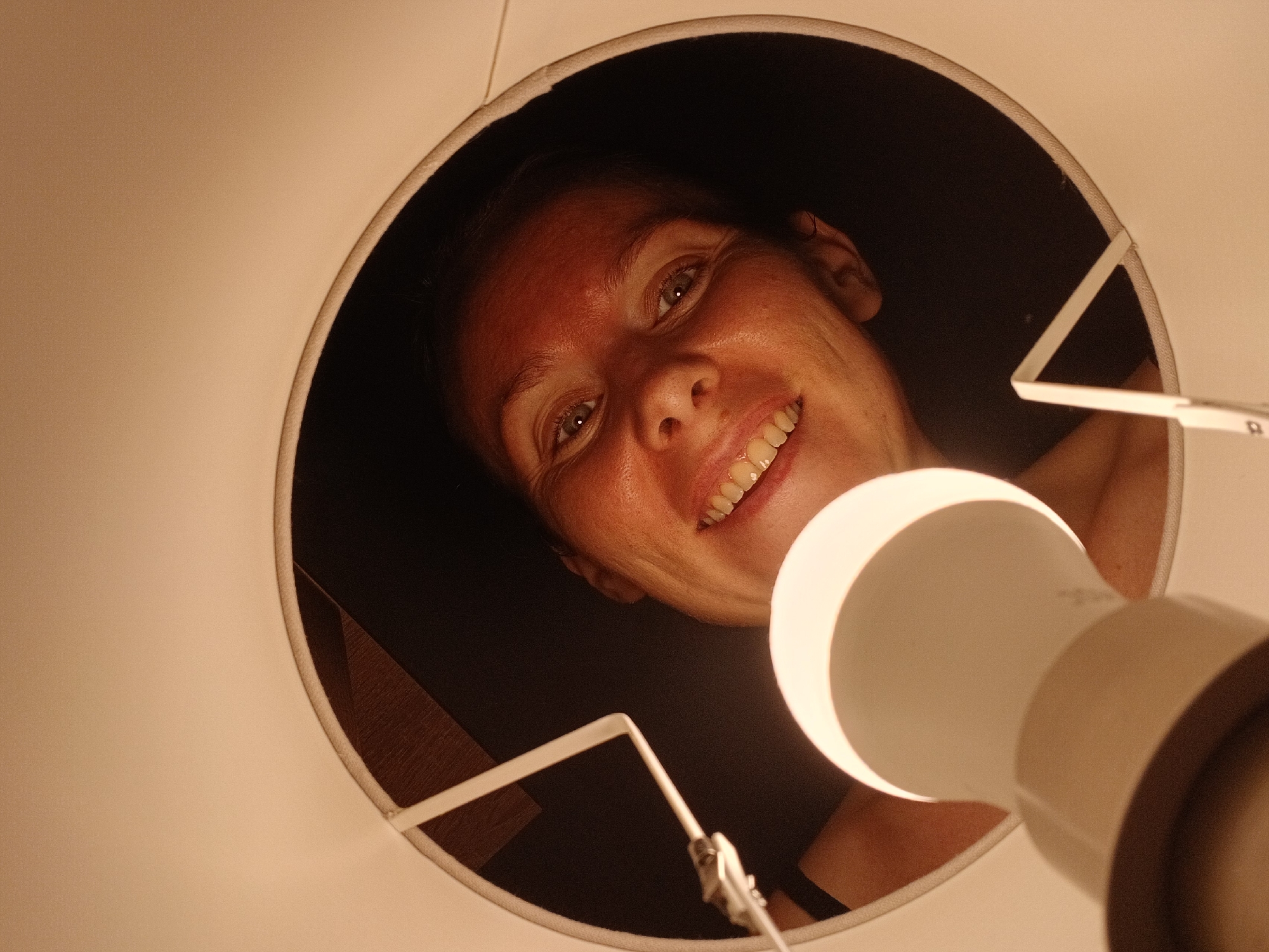 Casual home moments in Yekaterinburg: lampshade goofing, food, selfies