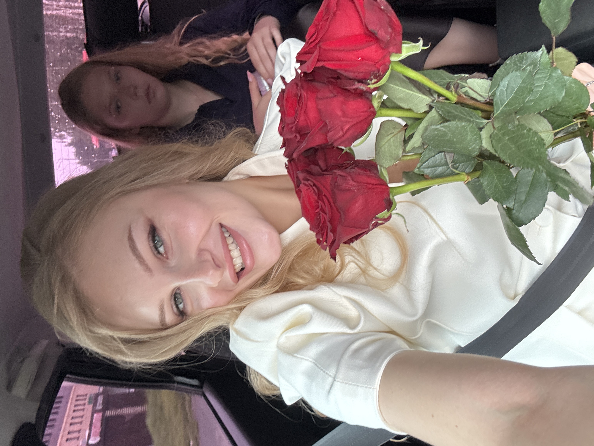 Red roses and good vibes in a car, Perm
