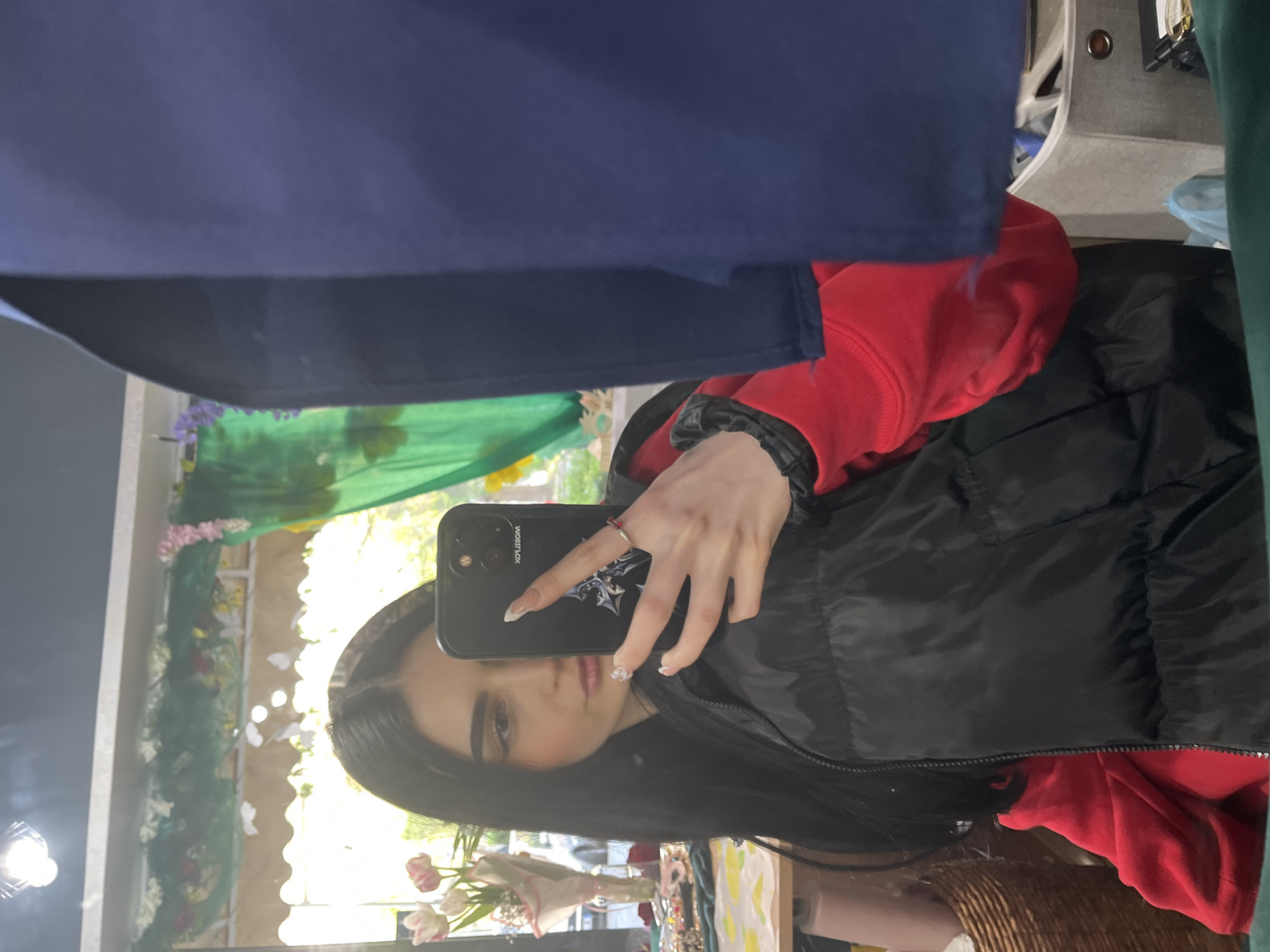 Woman documents afternoon stroll through Burgas with selfies, flowers