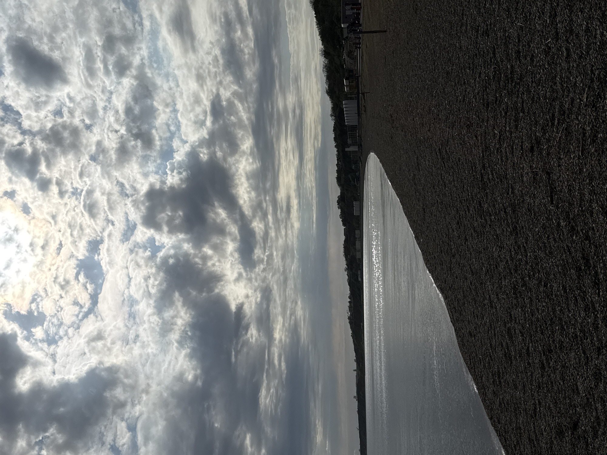 Woman documents coastal visit in Taman, Russia