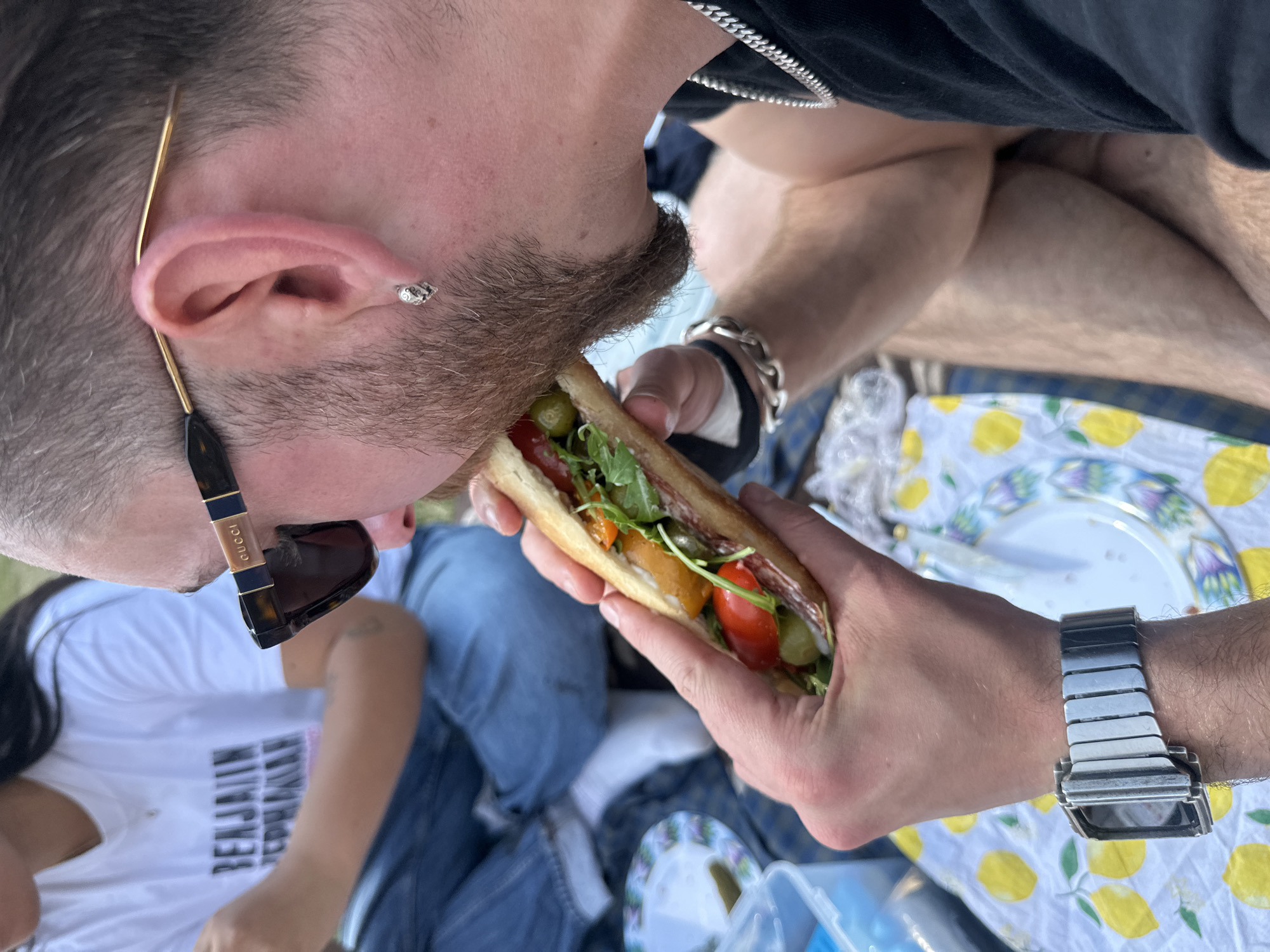 London park picnic captured during midday meal break