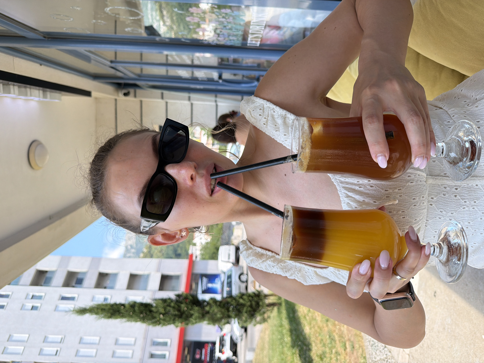 Café stop and selfies at a sunny Budva terrace