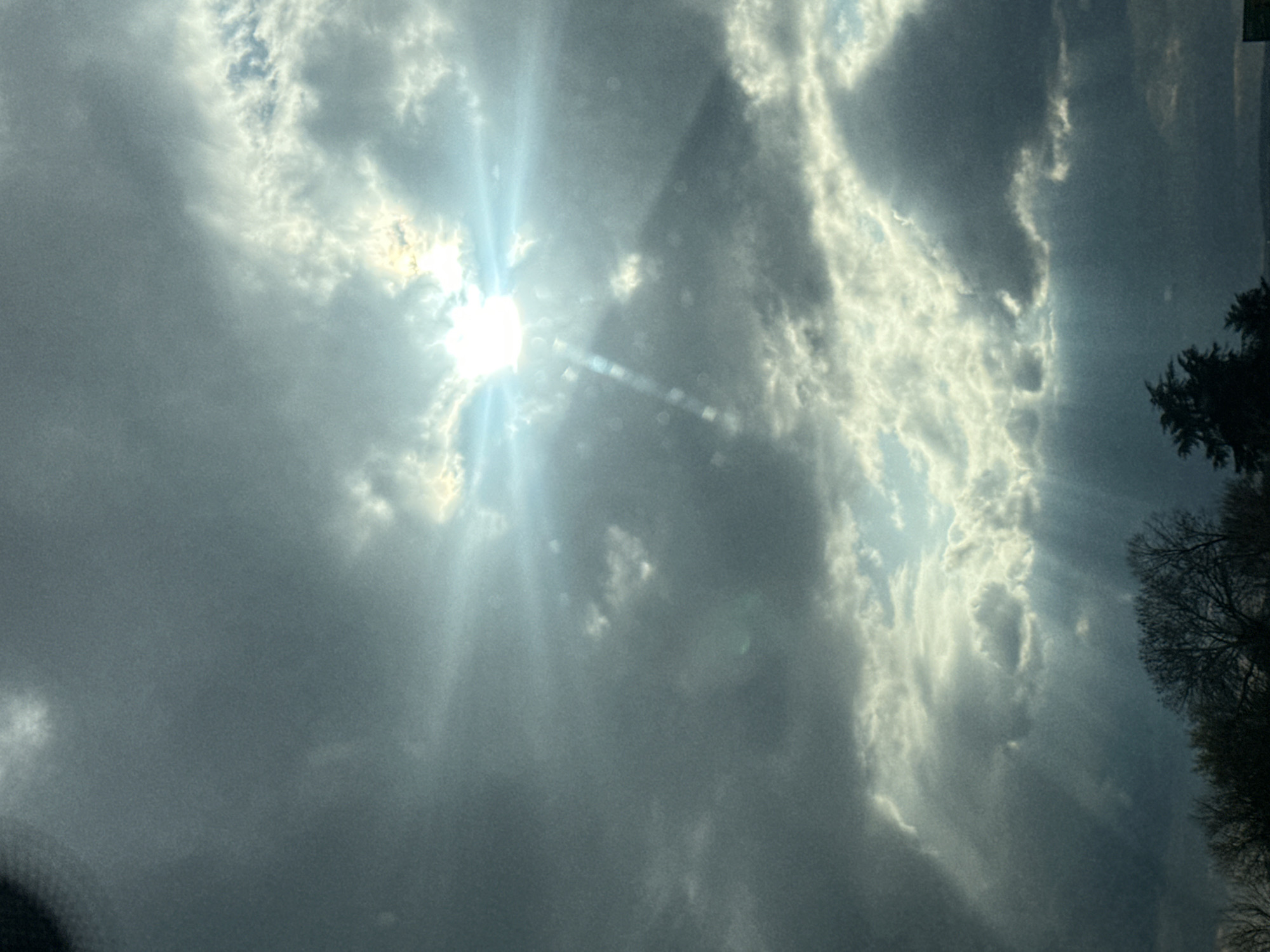 Sunlight breaks through clouds over Aksakovo, Bulgaria