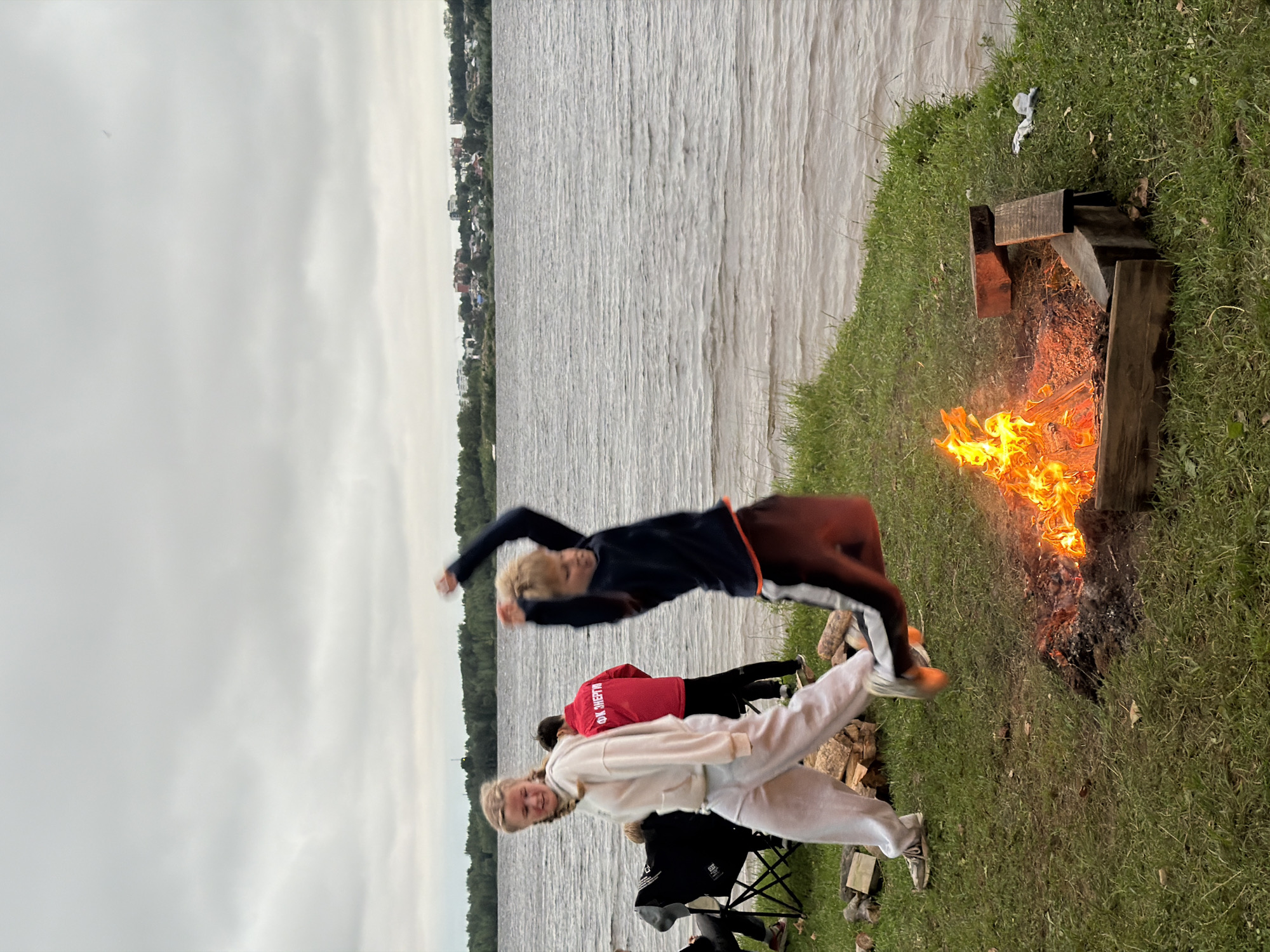 Riverside bonfire hangout with friends and a poodle, Noviy