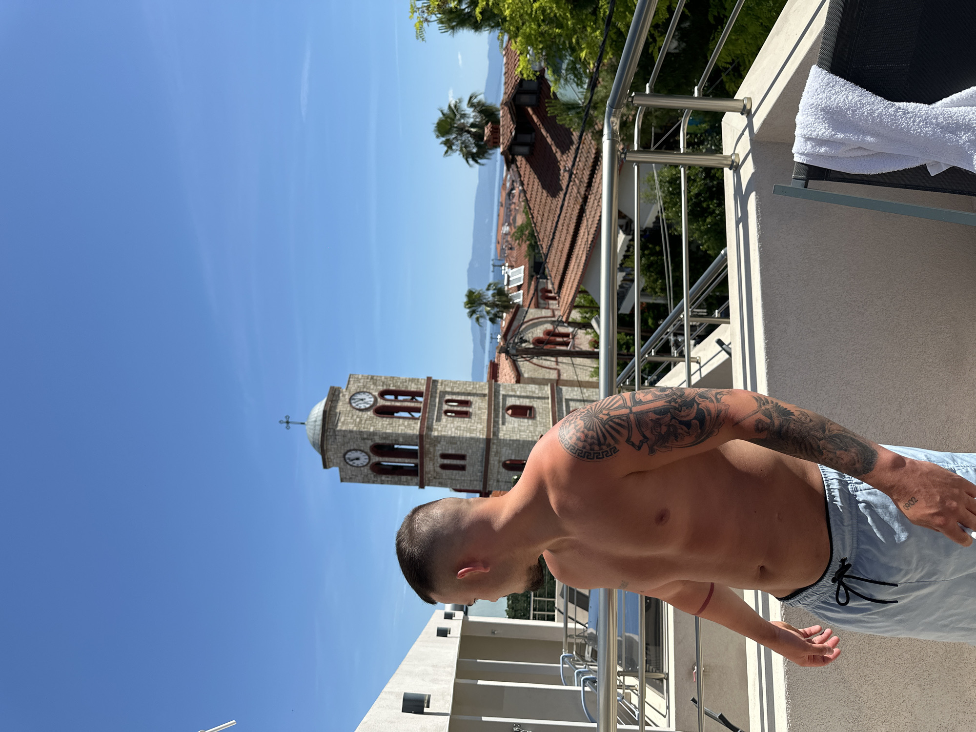 Man spotted on balcony in Pallini, Greece morning scene