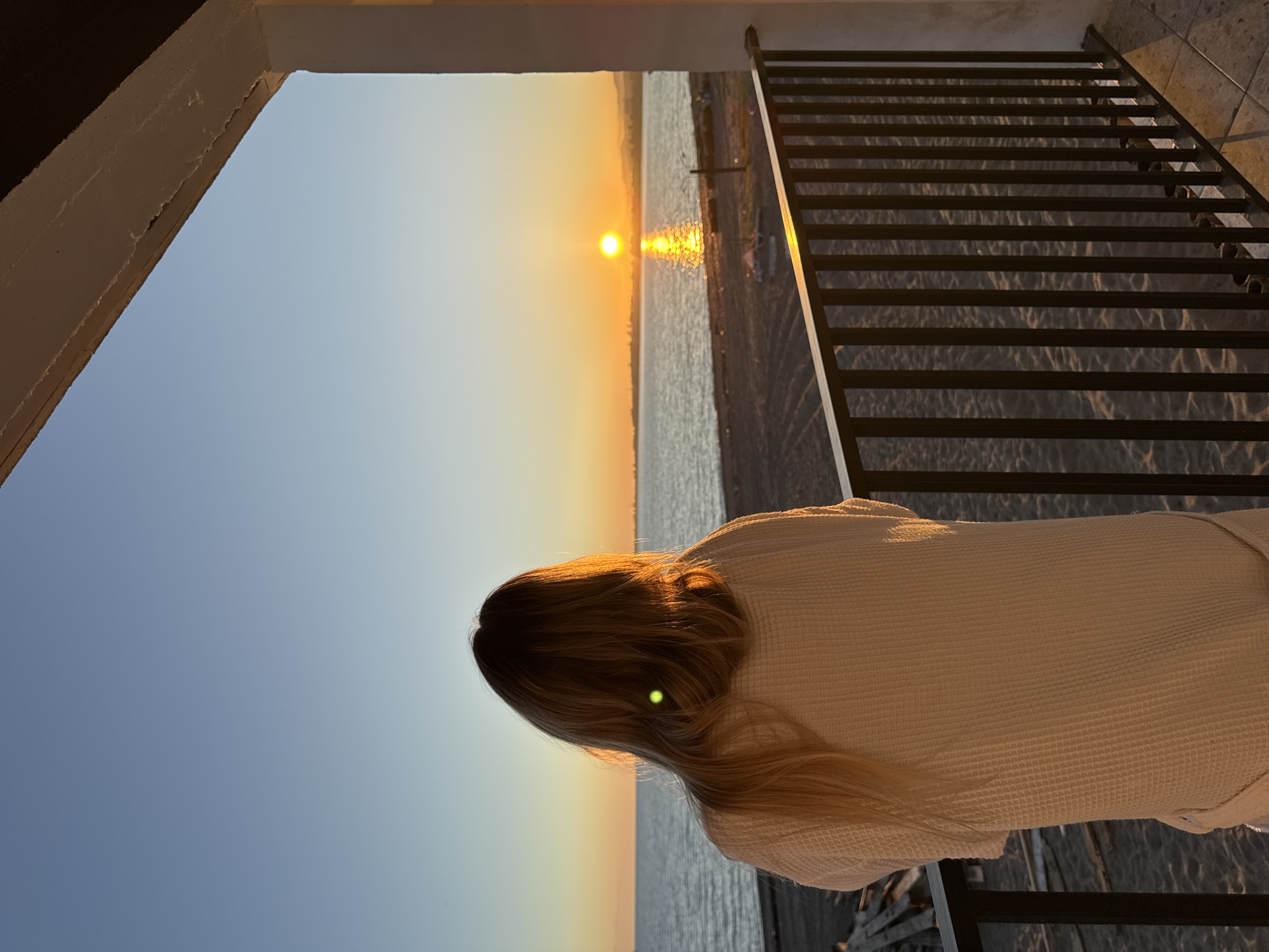 Woman photographed in white robe during Abkhazia photo session