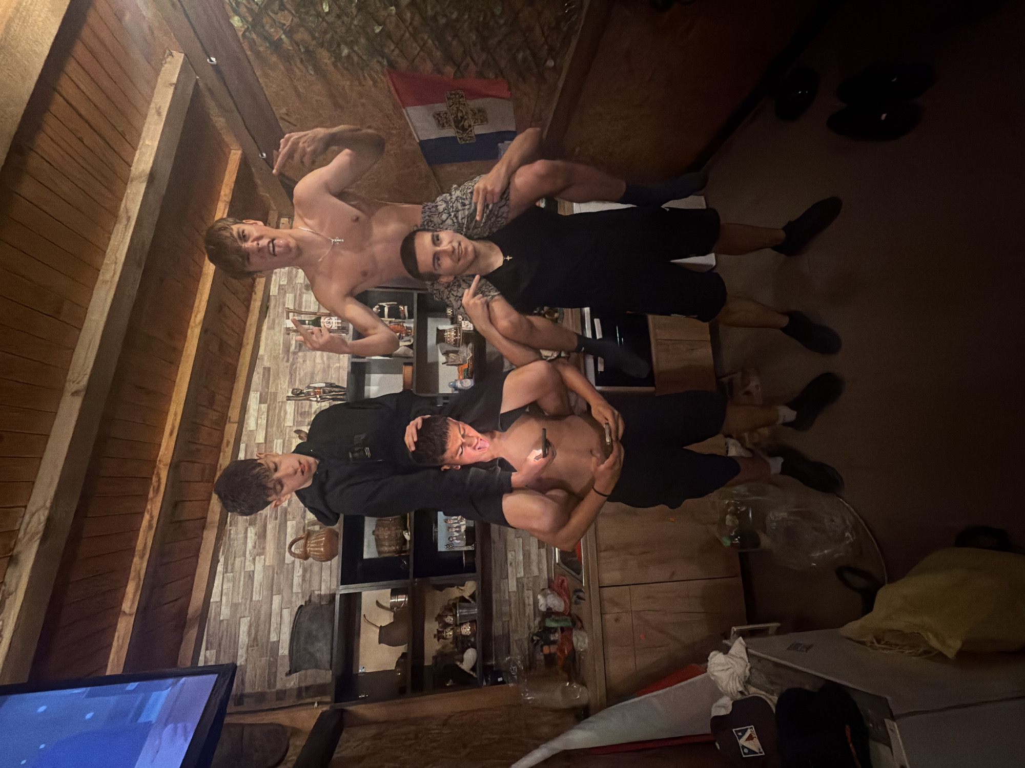 Young men gather for casual indoor party in Bulgaria