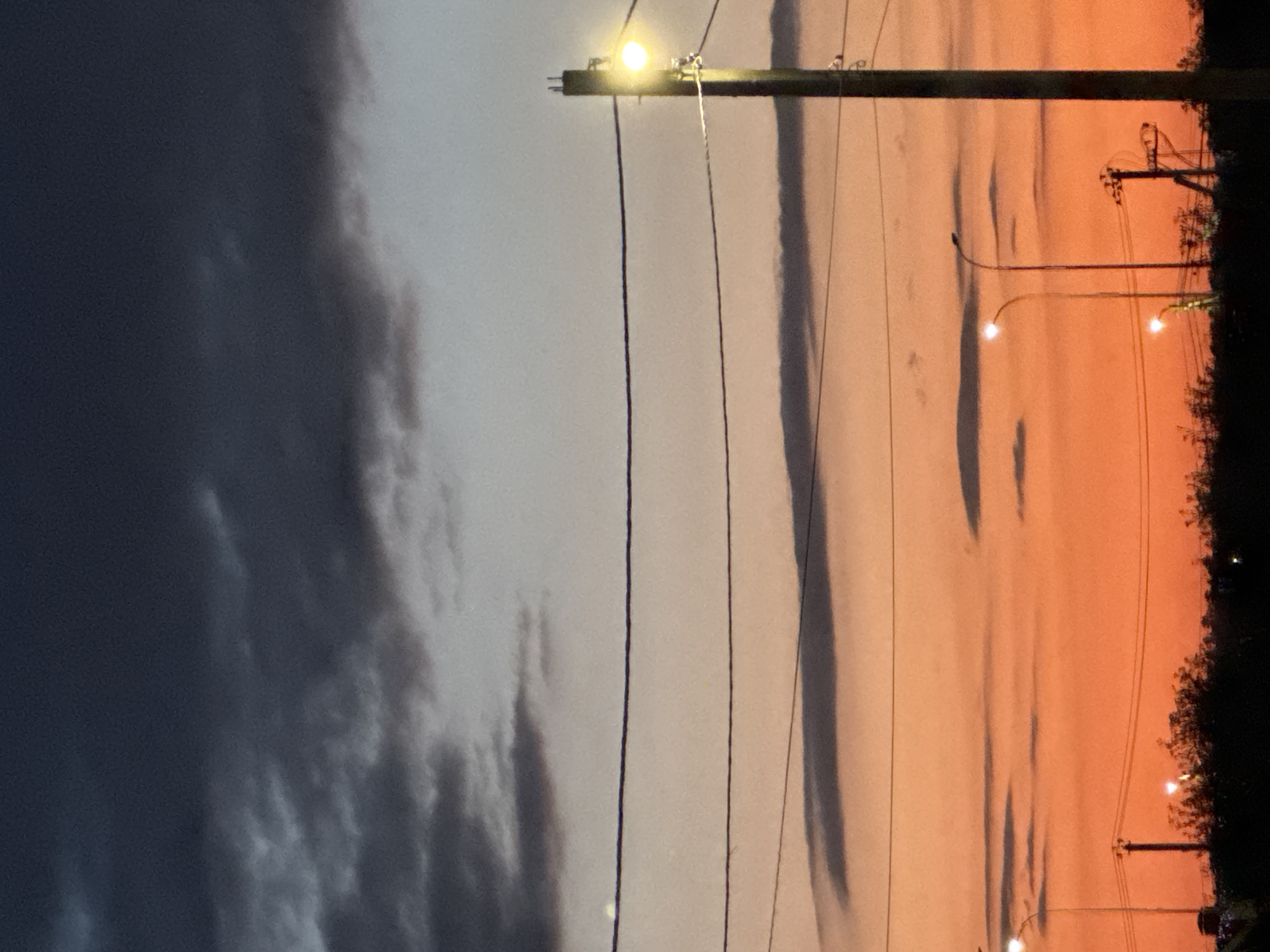 Sunset to moonrise over a Russian city, July evening