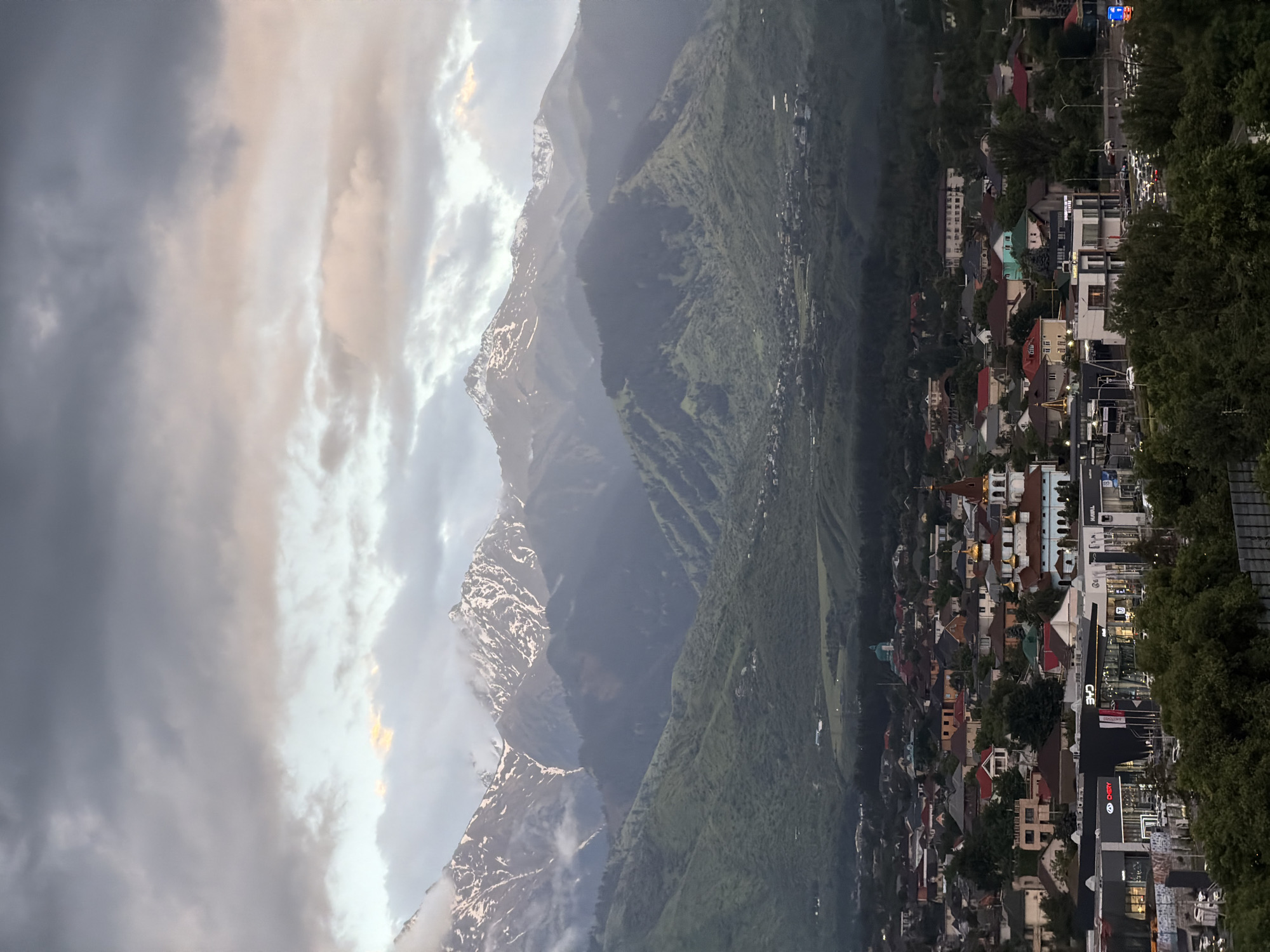 Almaty residents document city views with Tian Shan mountains backdrop