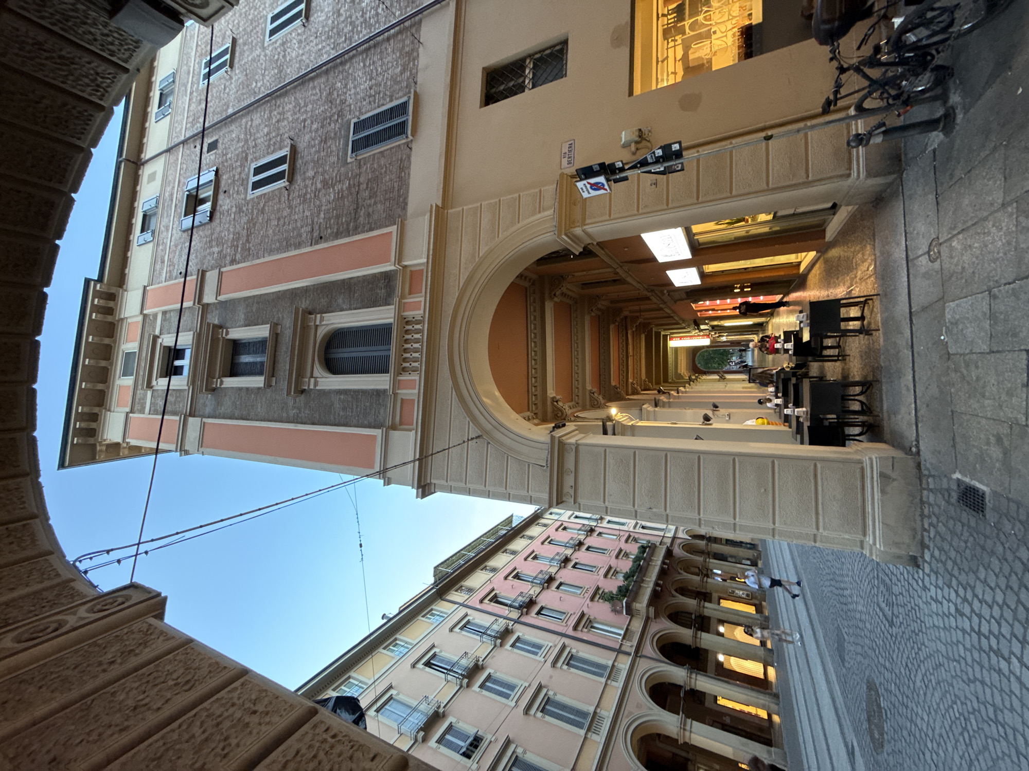 Evening wander through Bologna's porticoes, piazzas, and aperitivo hour