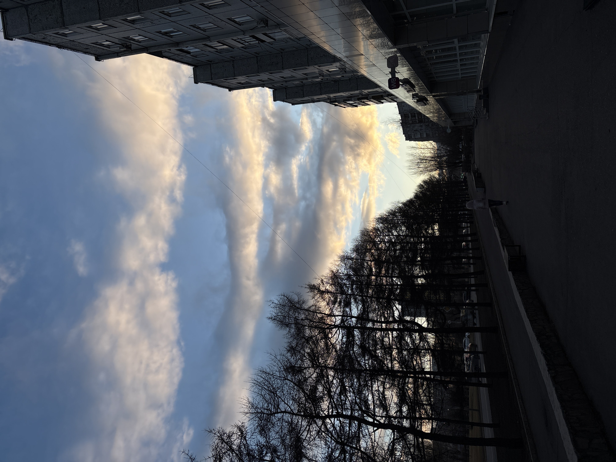 Afternoon scenes captured in Krasnoyarsk showing buildings and portrait