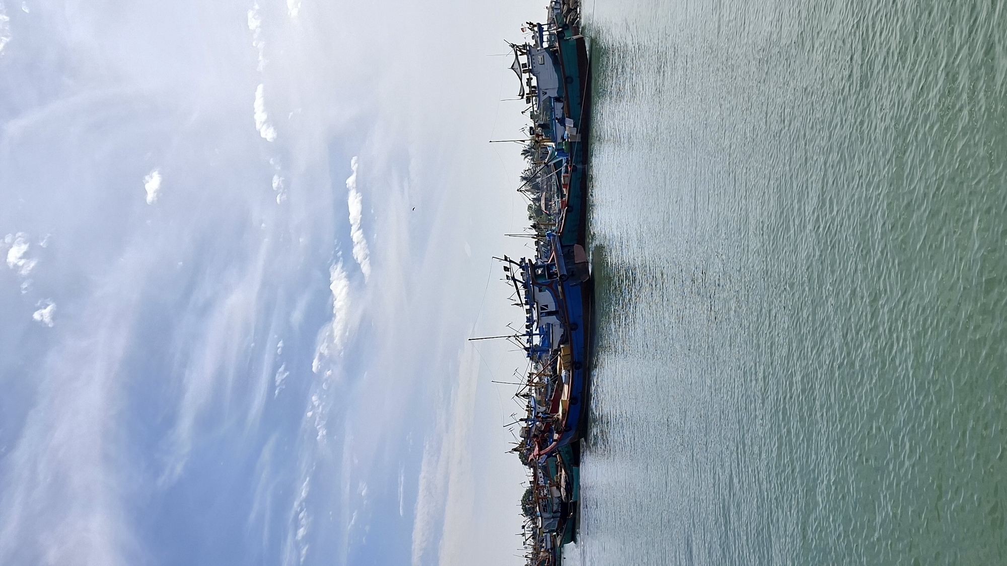 Fishing harbor and street life in Lhokseumawe, Indonesia