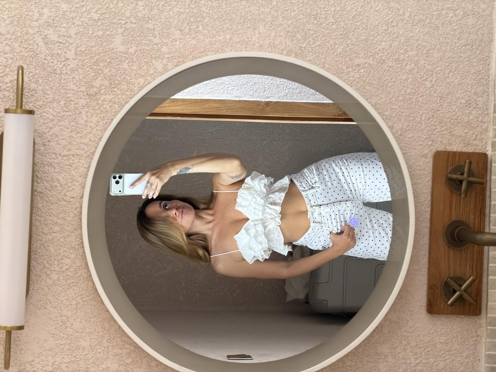 Mirror selfies and clutch details in a stylish Mengwi kitchen