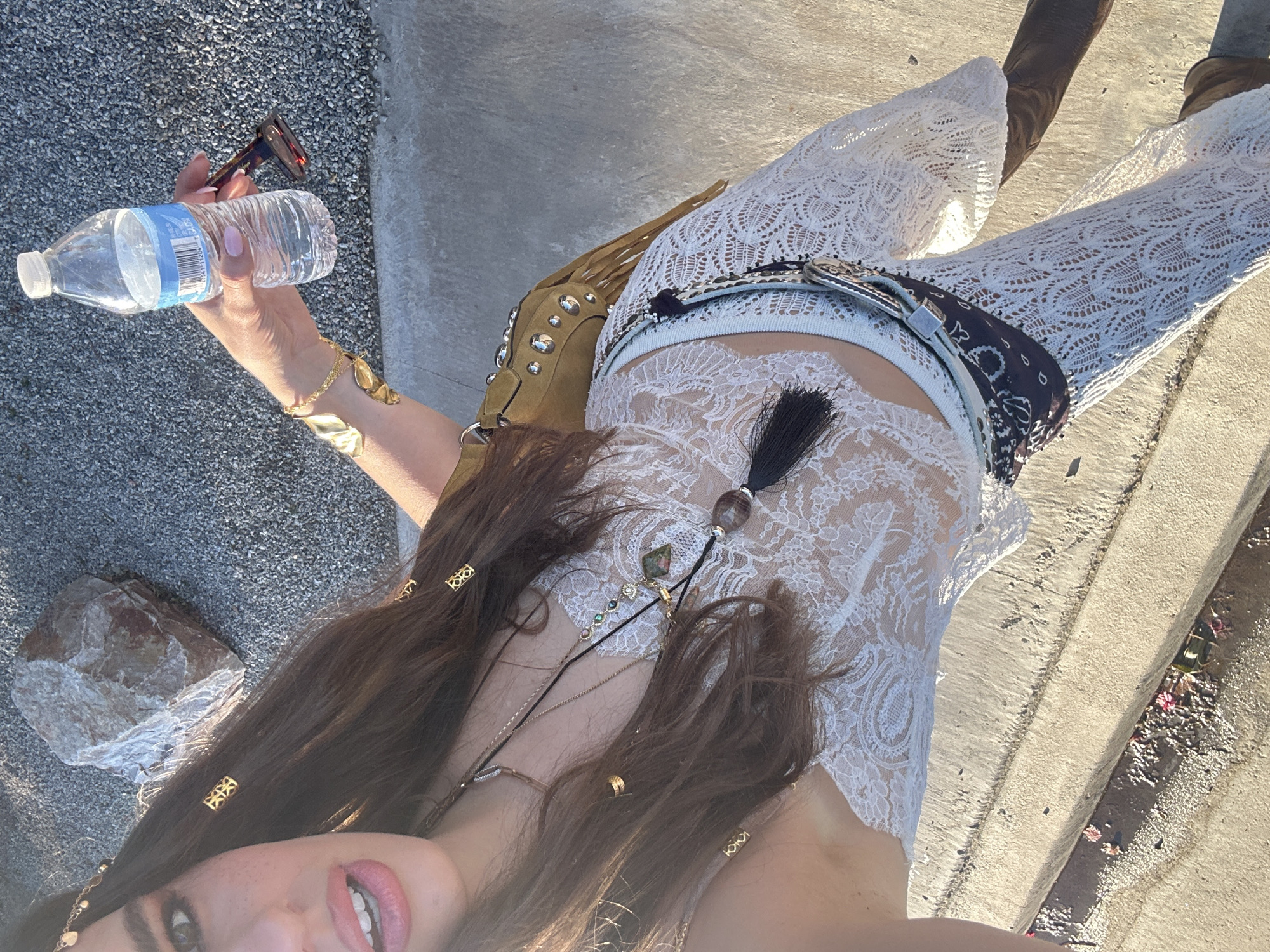 Woman in white outfit spotted outdoors in Indio