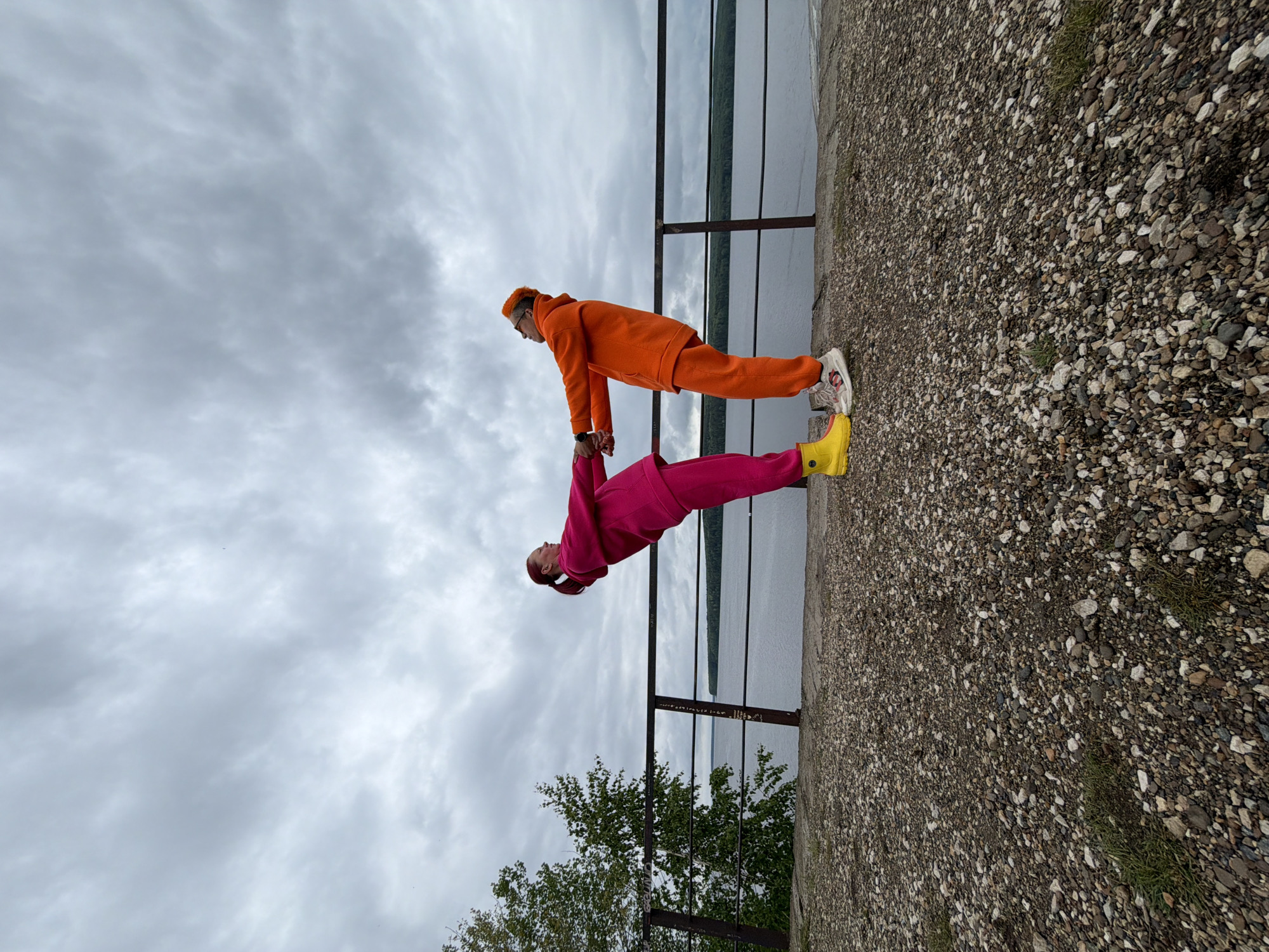 Tracksuit-clad duo performs stunts on Chaikovsky riverfront embankment