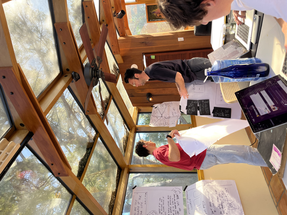 Three collaborate on project in Topanga sunroom workspace