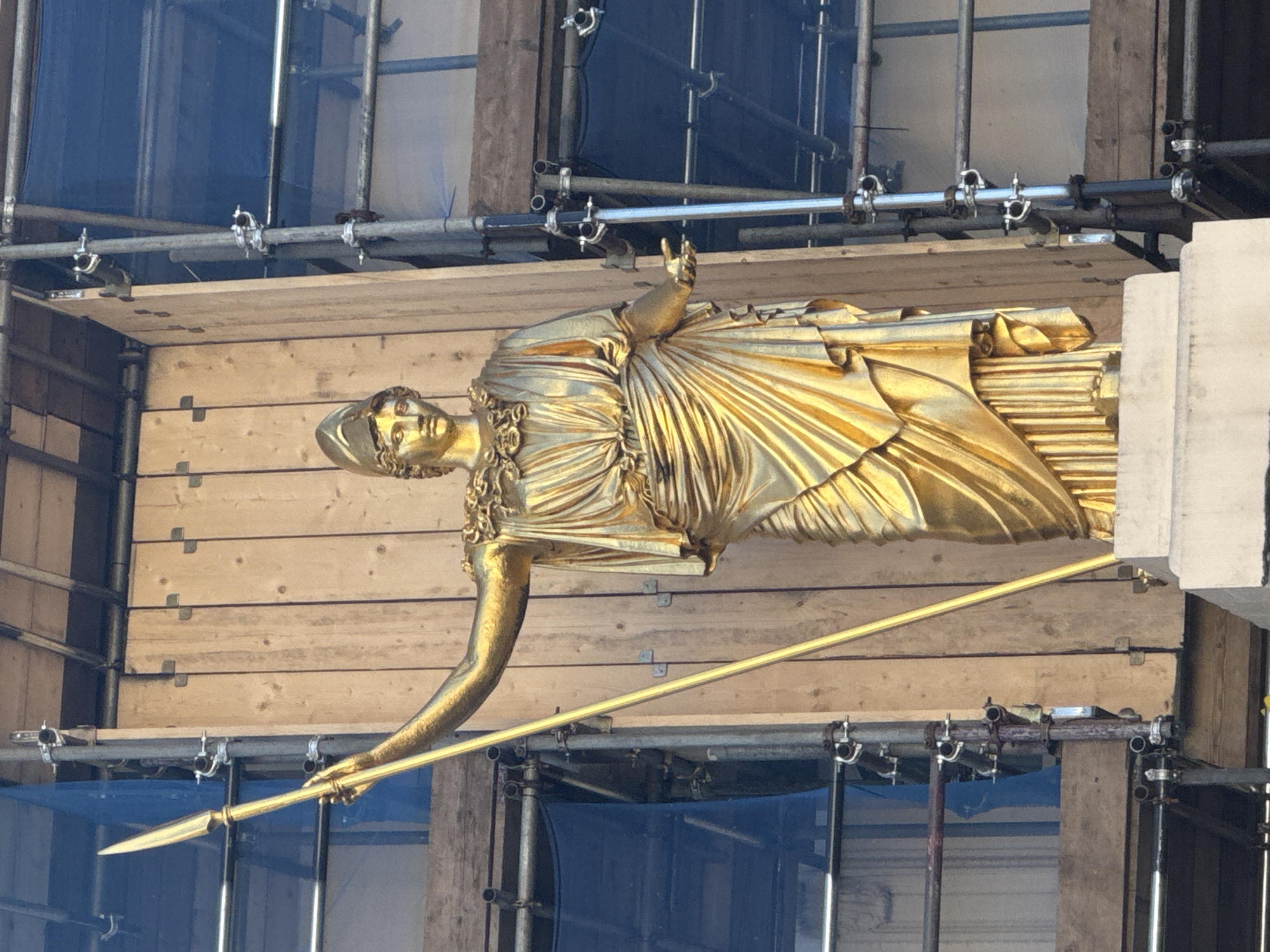 London scenes: statue maintenance, park fountain, illegally parked Lamborghini