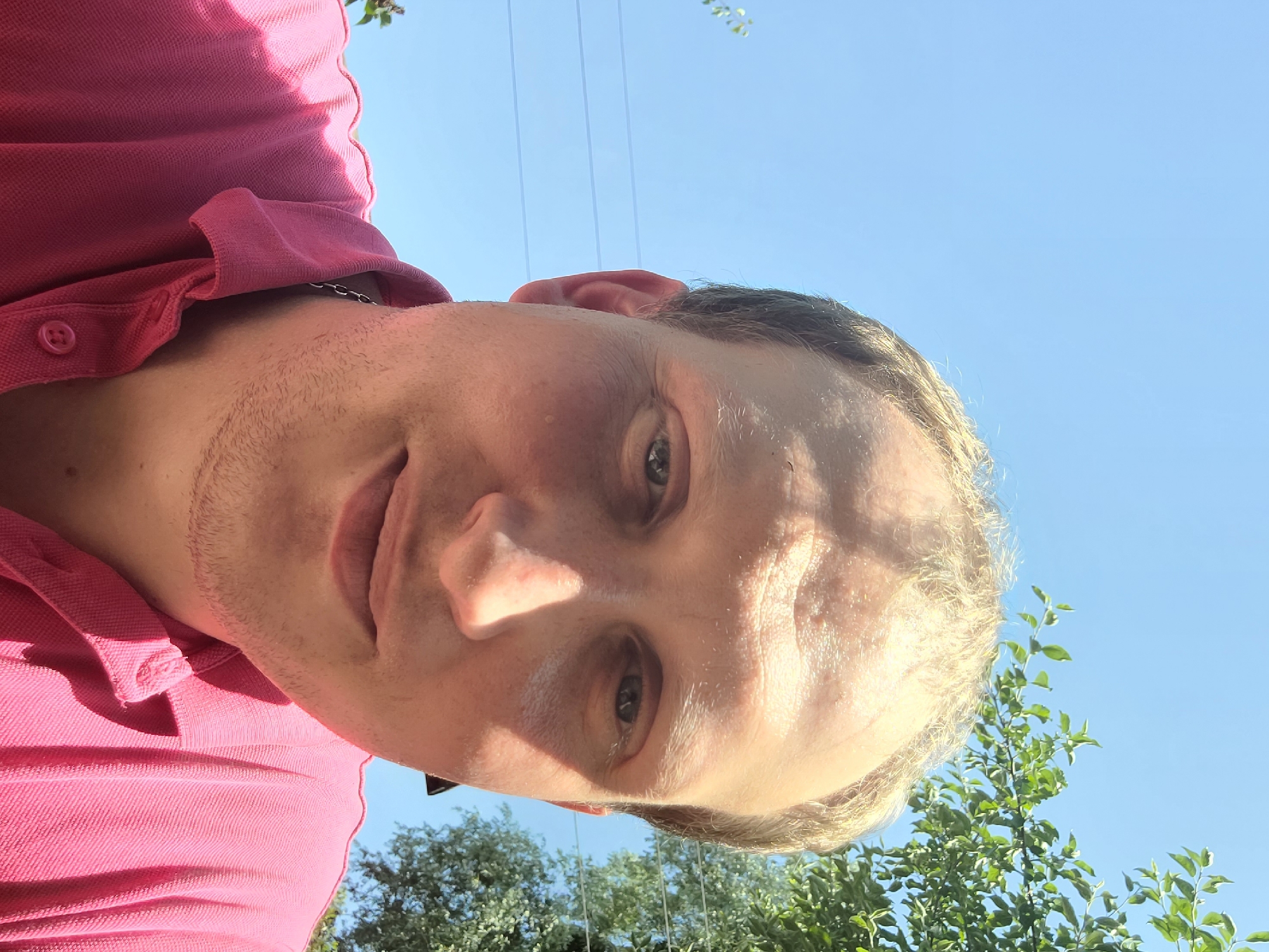 Pink polo selfies and backyard summer scenes with cherries and roses