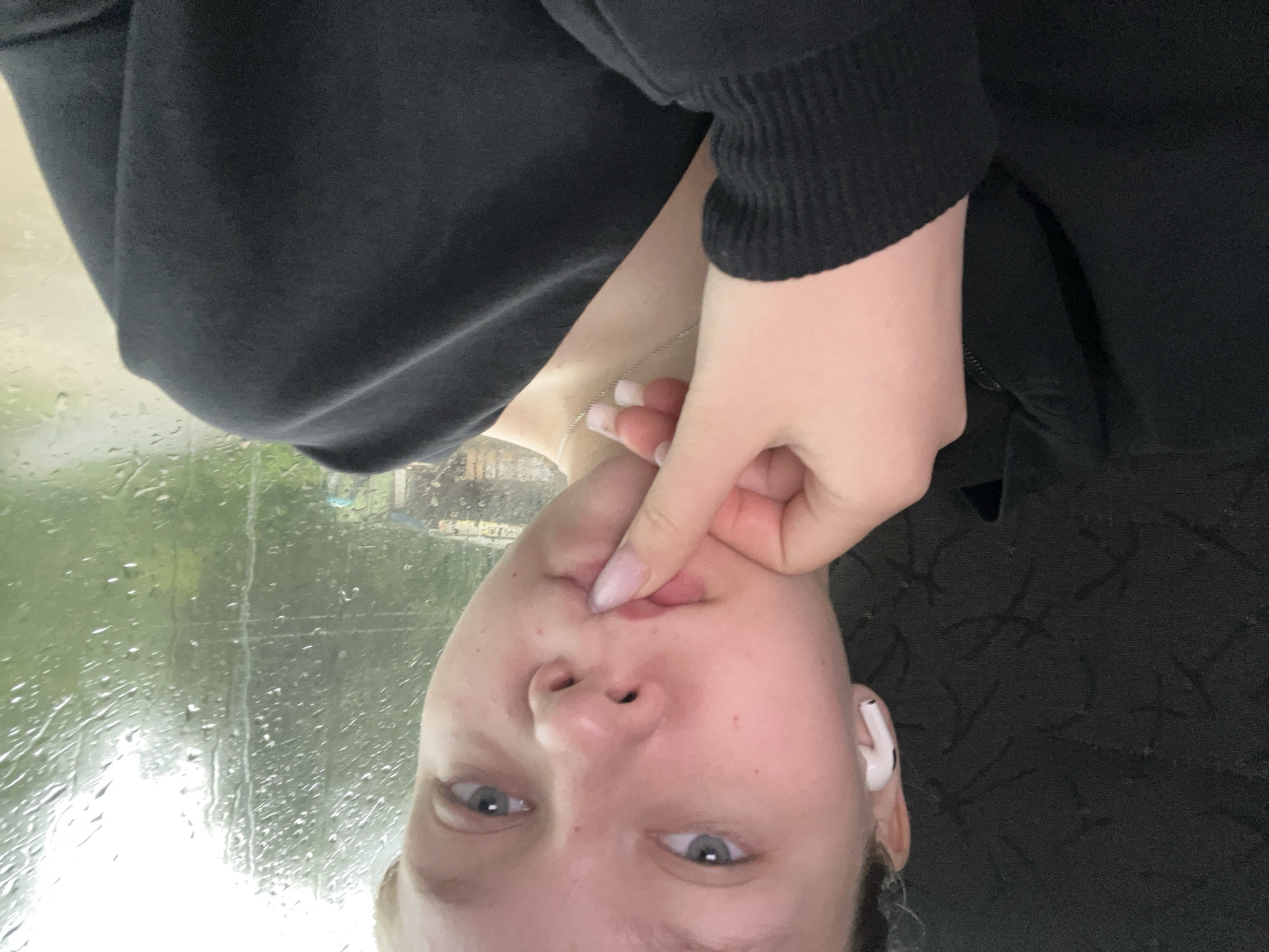 Close-up portrait with earbuds, Krasnokamsk, Russia
