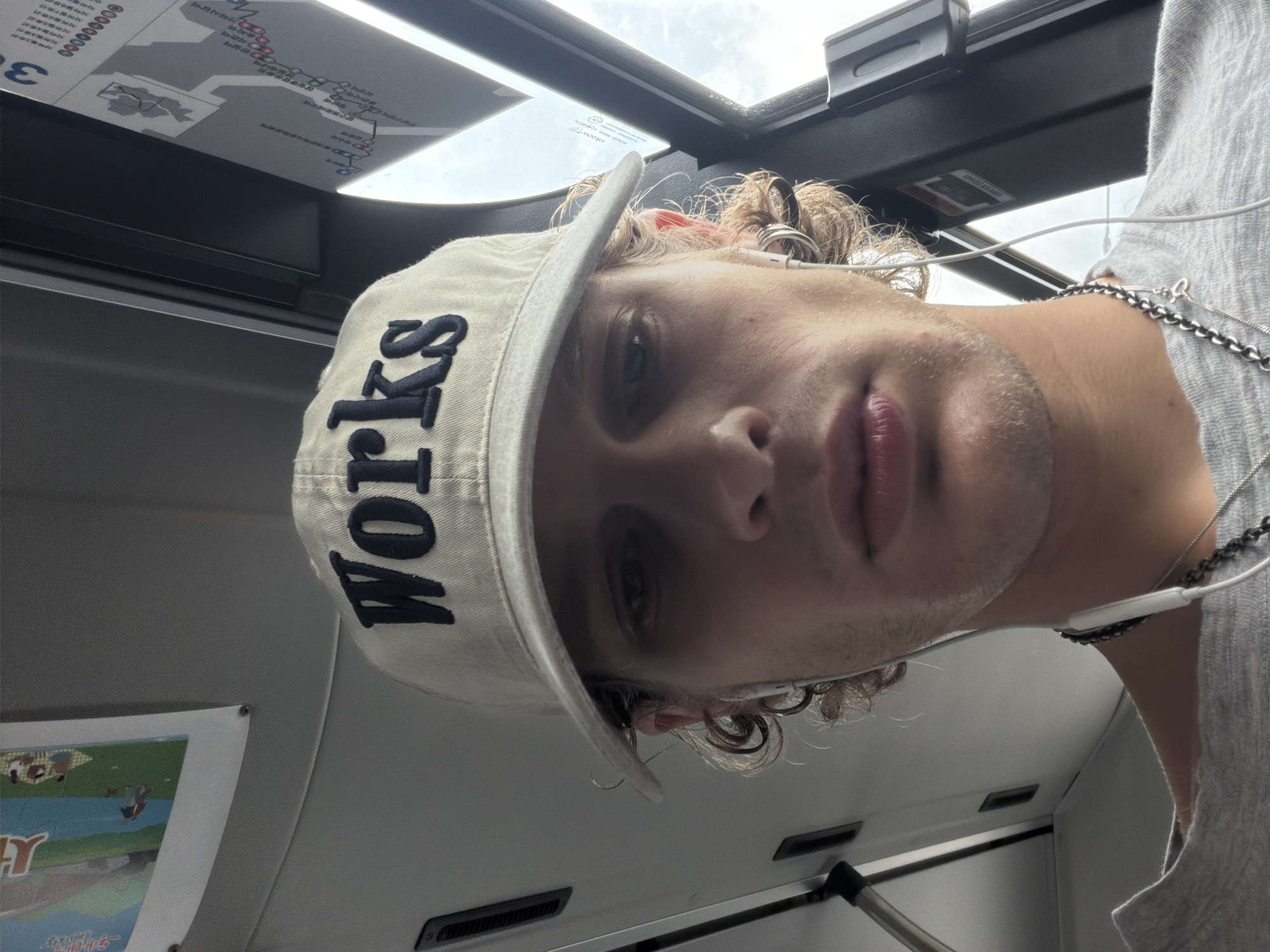 Close-up cap selfie on the streets of Seoul