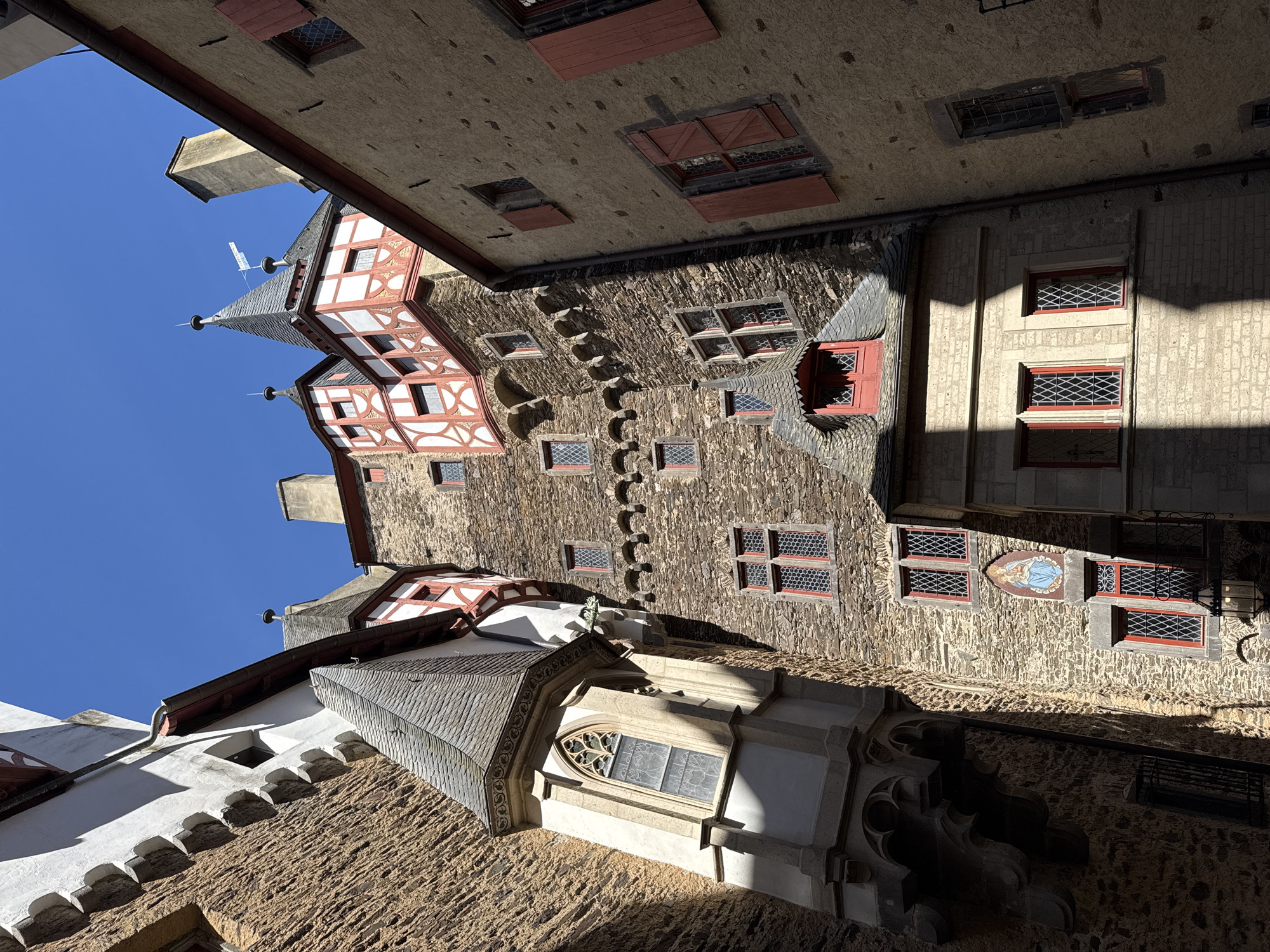 Tourist captures medieval architecture at Burg Eltz castle
