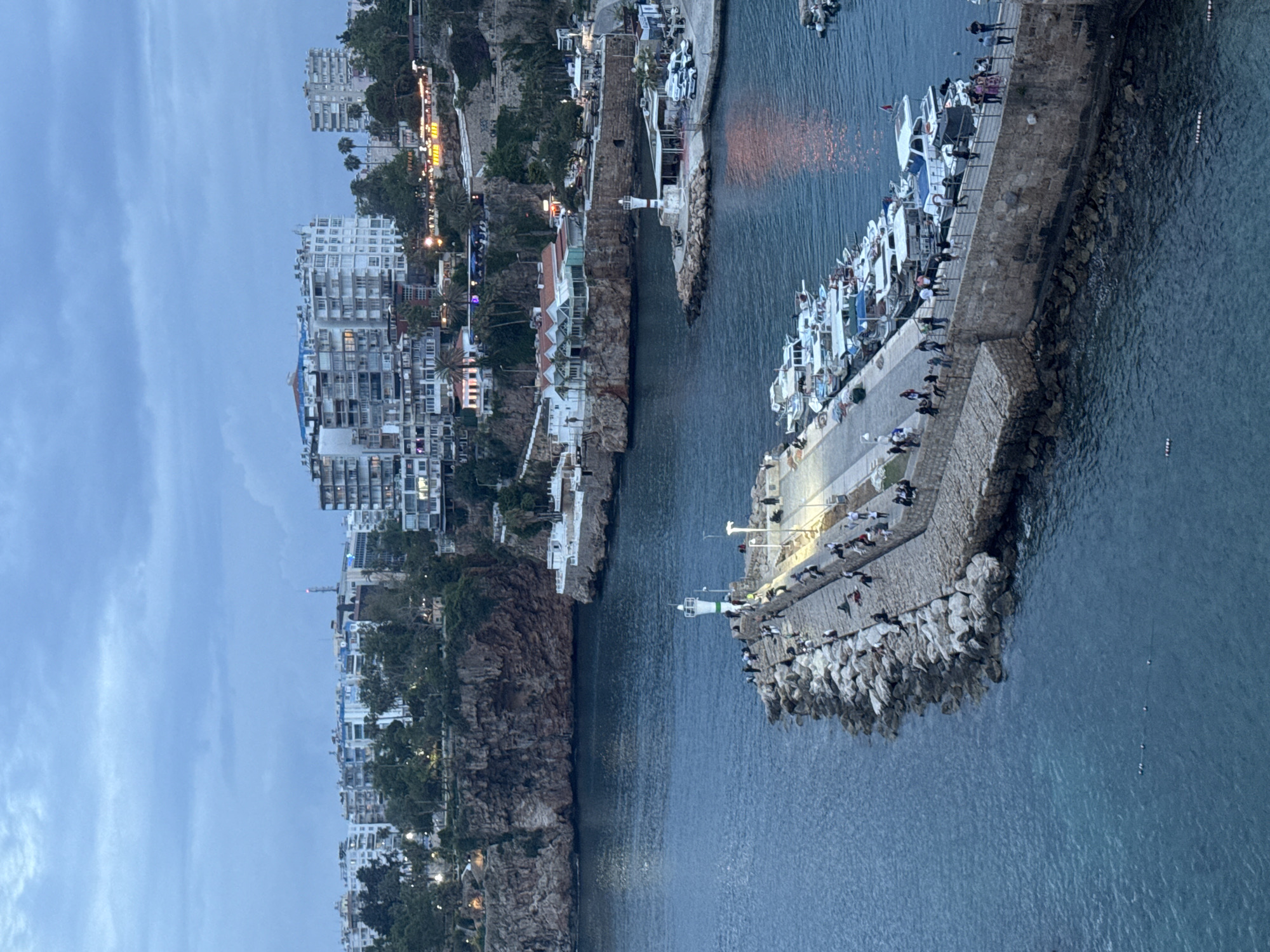 Evening scenes documented around Antalya harbor and coastline