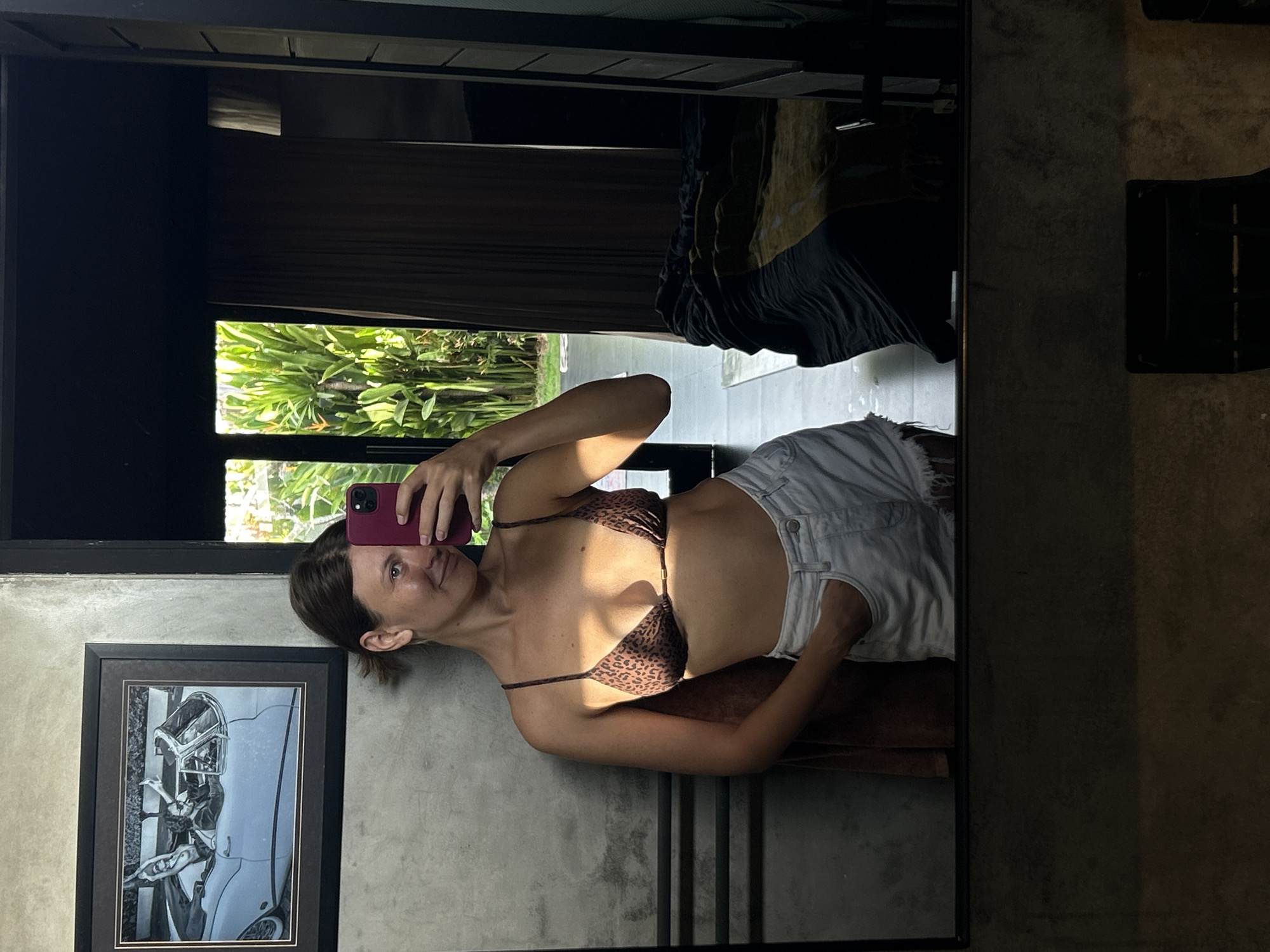 Woman takes mirror selfies in leopard bikini in Mengwi