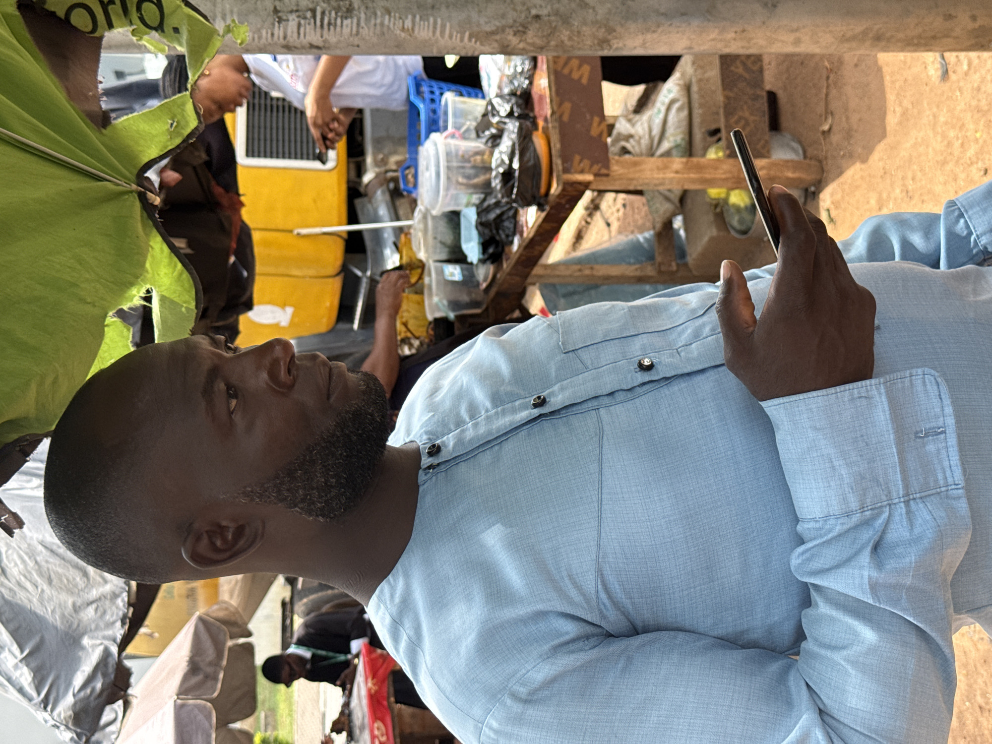 Daily life unfolds across Abuja markets and streets