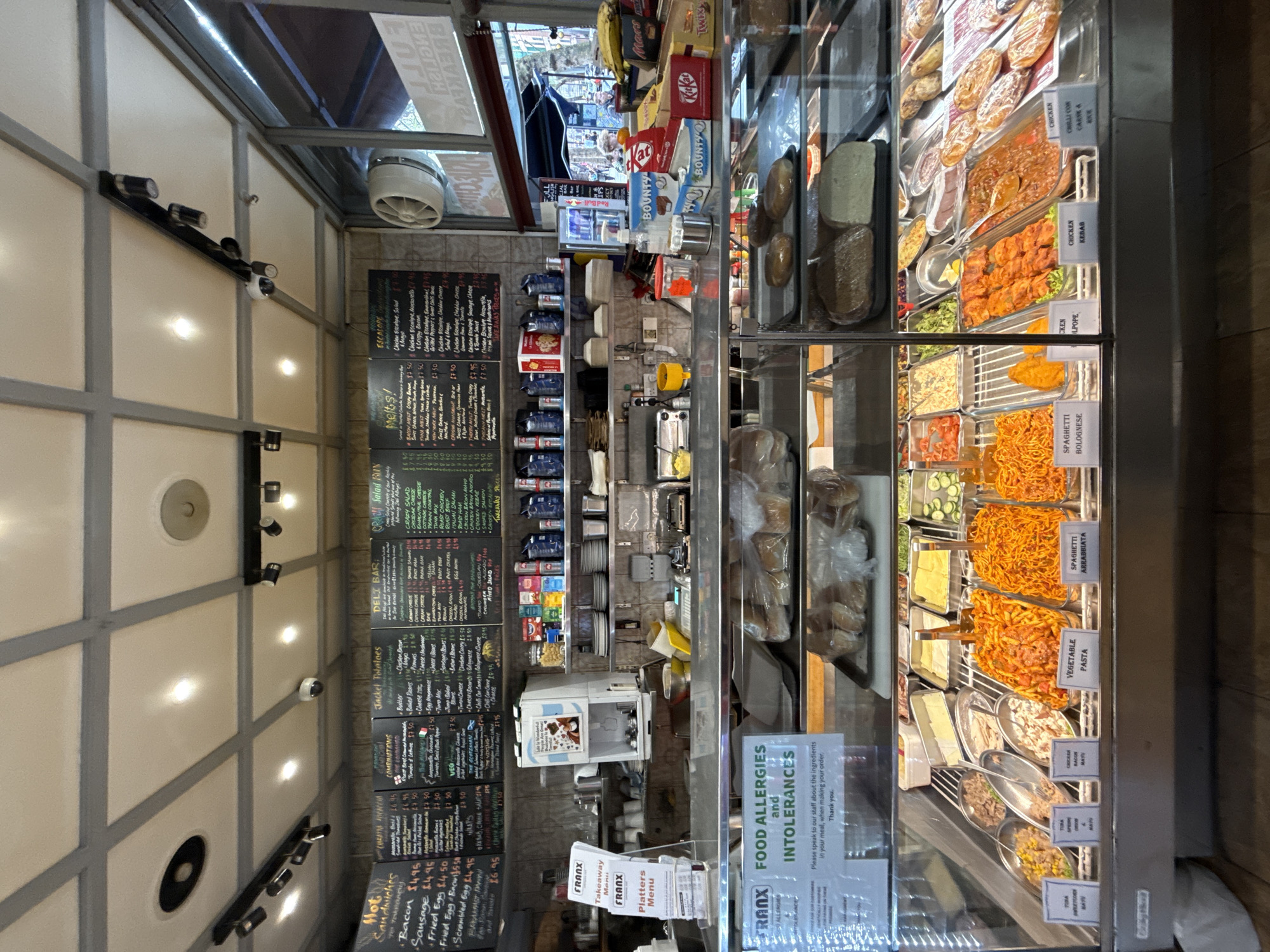 London food stall displays prepared meals in bright setting