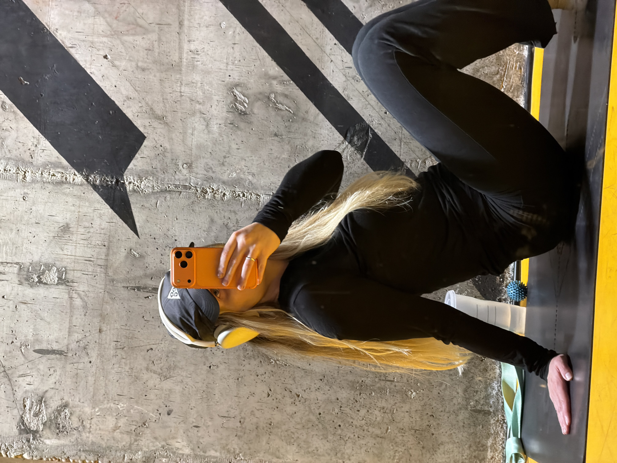 Woman exercises on mat at Tel-Aviv fitness facility