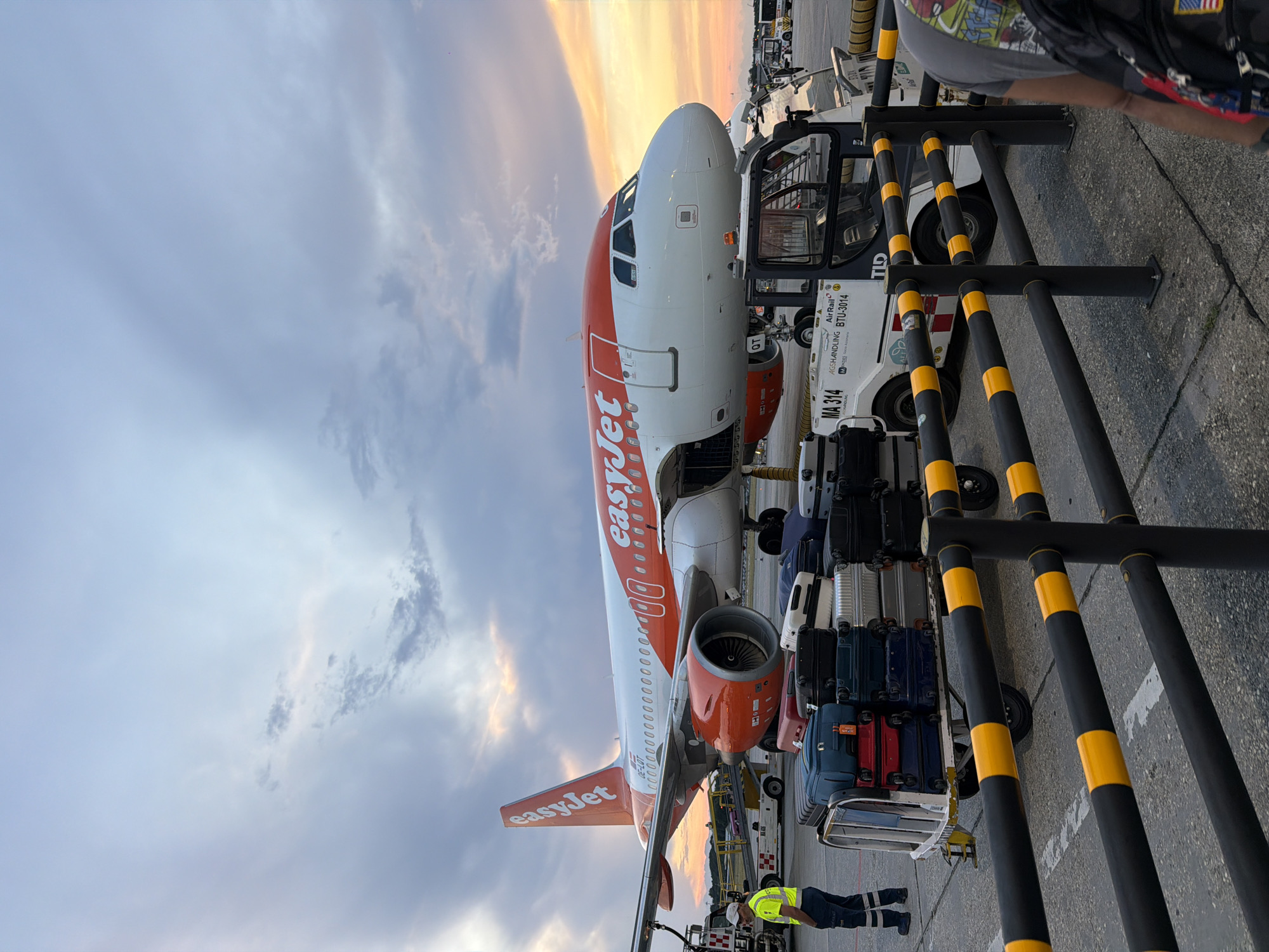 Malpensa at sunset: tarmac and shuttle bus, July evening