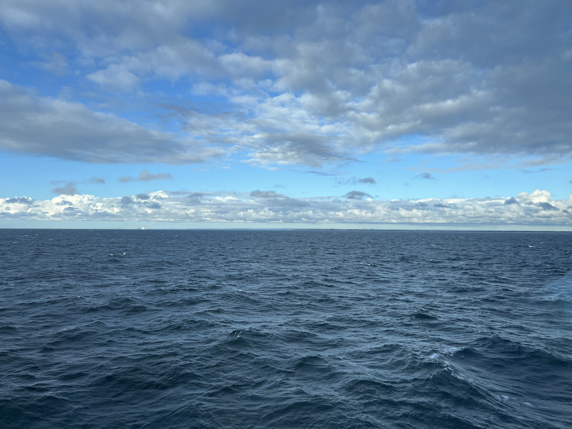 Choppy Baltic Sea views near Gdańsk under shifting skies