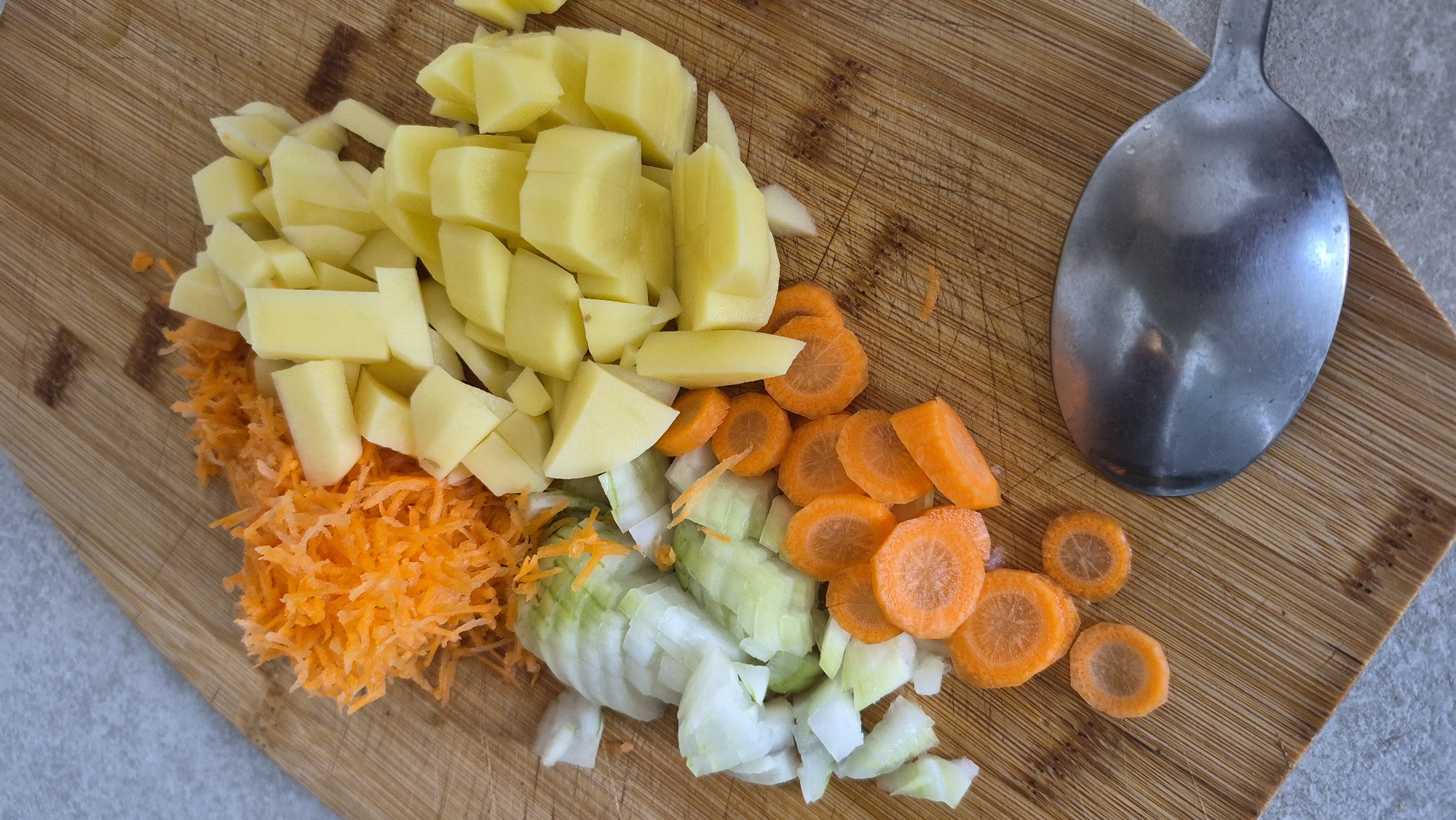 Cooking prep and flowering plants in a Latvian home