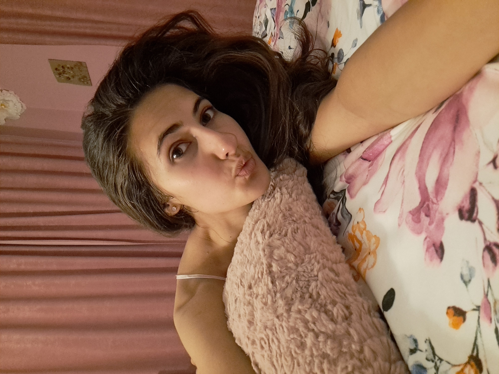 Woman photographed in bedroom in Chepintsi, Bulgaria